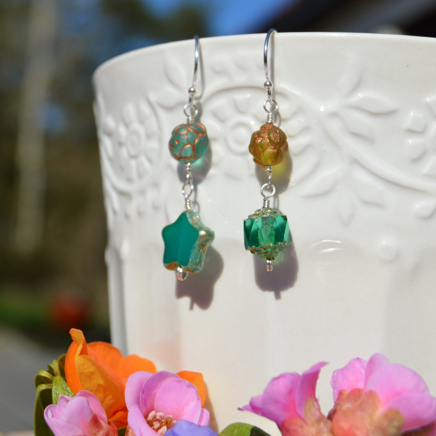 Sterling silver earrings made of Czech glass beads in green and turquoise tones.