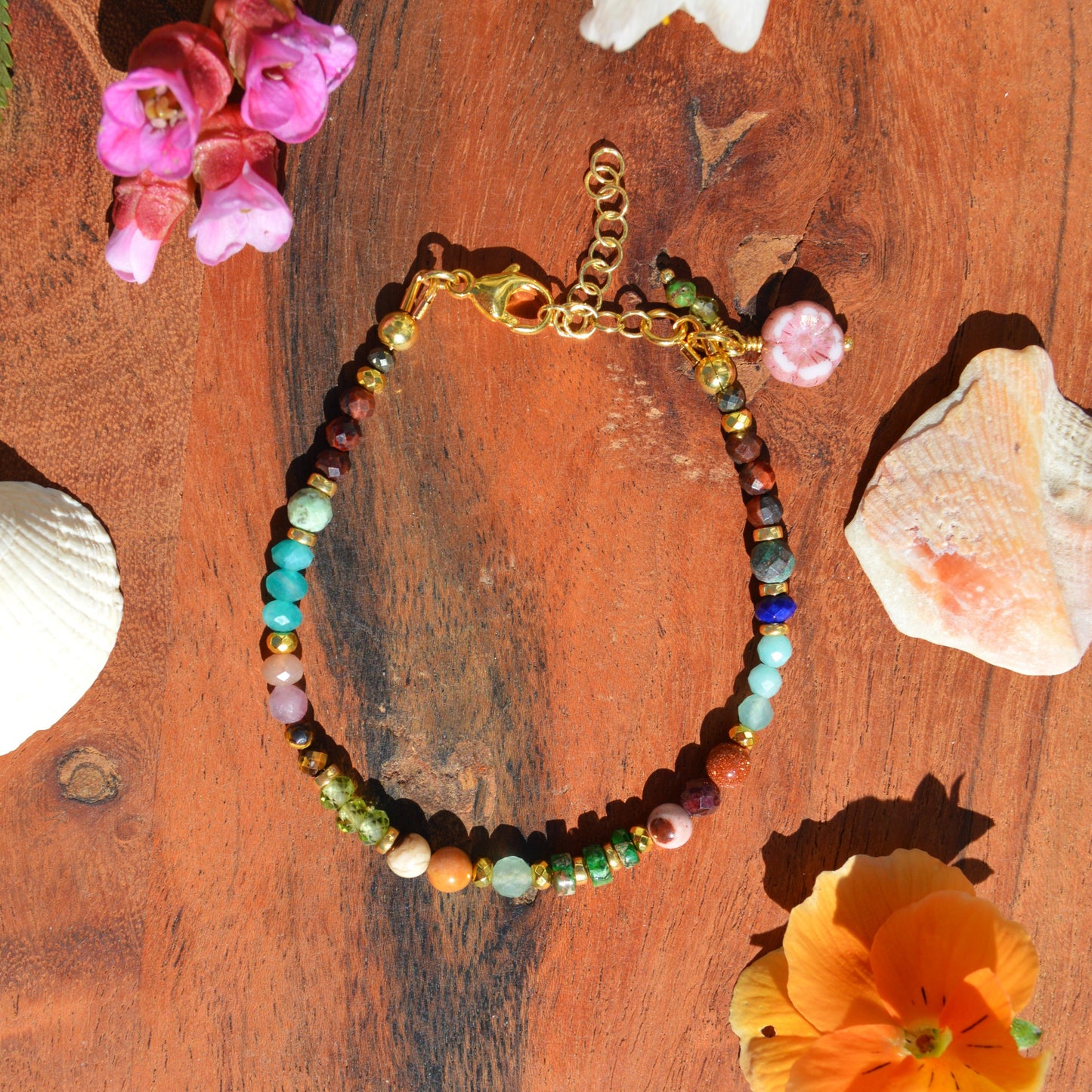Gold-plated sterling silver bracelet made of colourful gemstones with Czech glass flower bead.