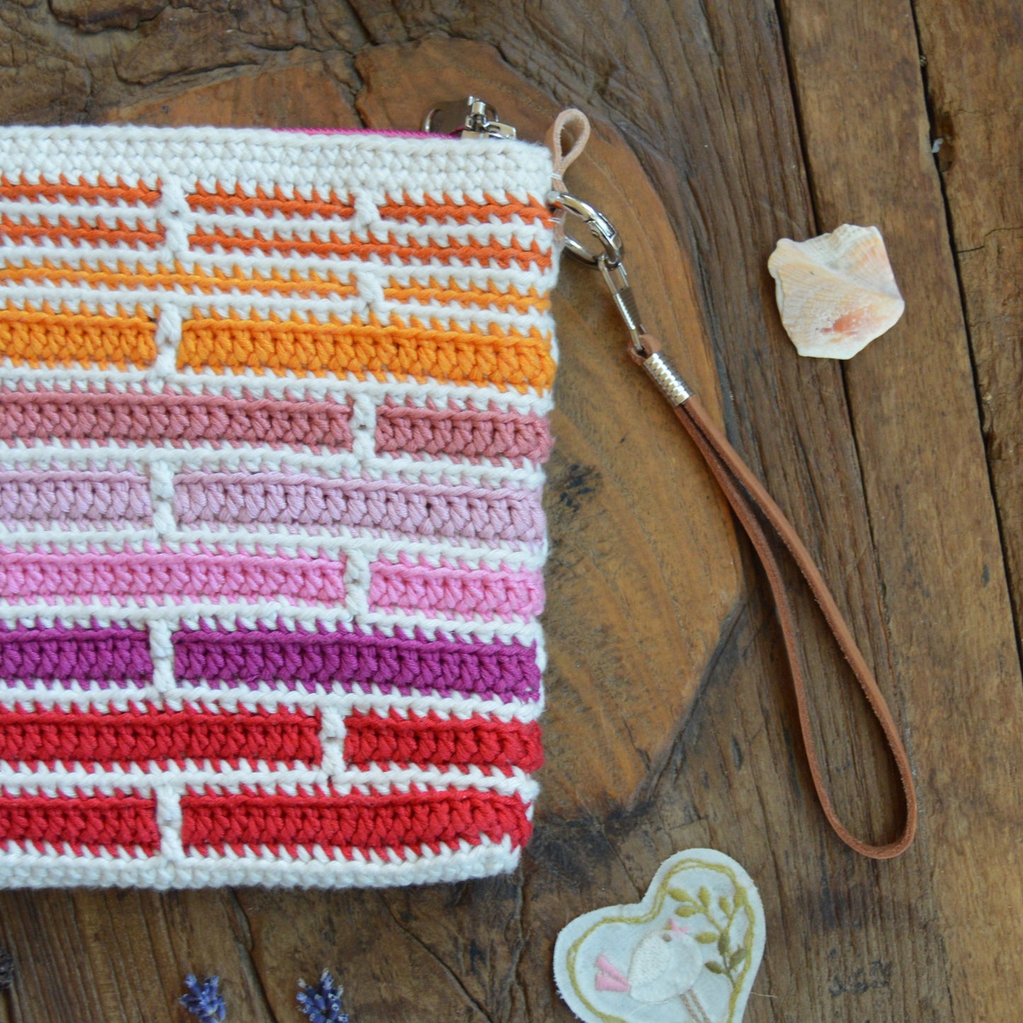 Crochet cotton Clutch Handbag Falling into Bricks. Detachable leather hang.