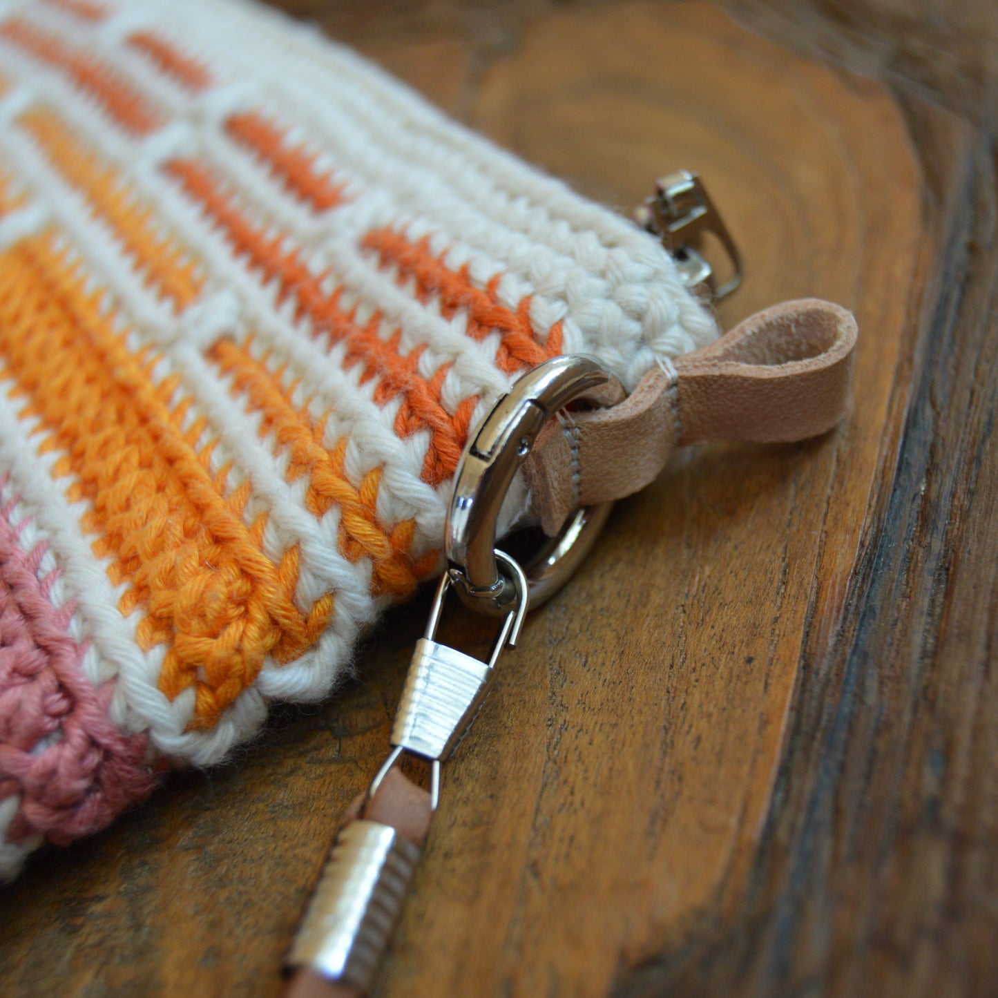 Crochet cotton Clutch Handbag Falling into Bricks. Detachable leather hang and strap for attaching a strap.