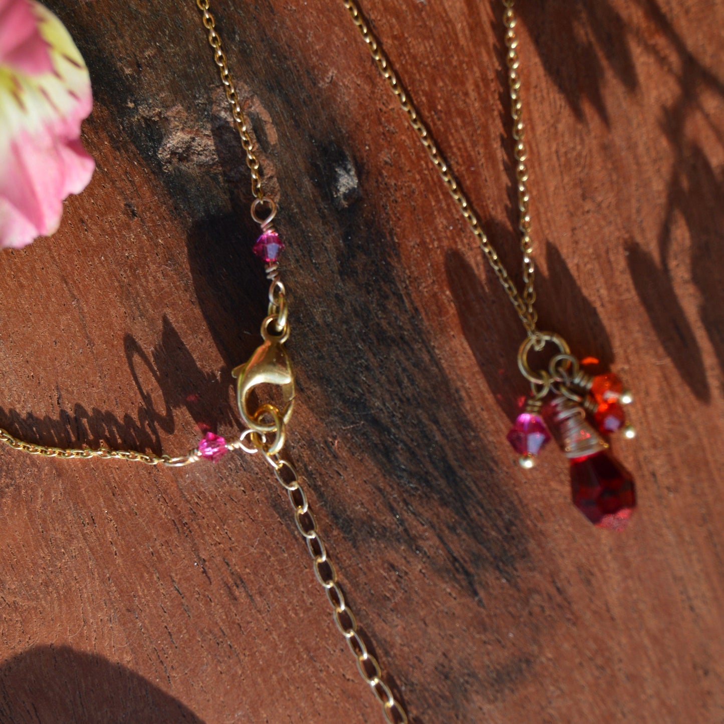Gold-plated sterling silver necklace with small cluster of Premium Czech glass bicones and wire-wrapped drop.