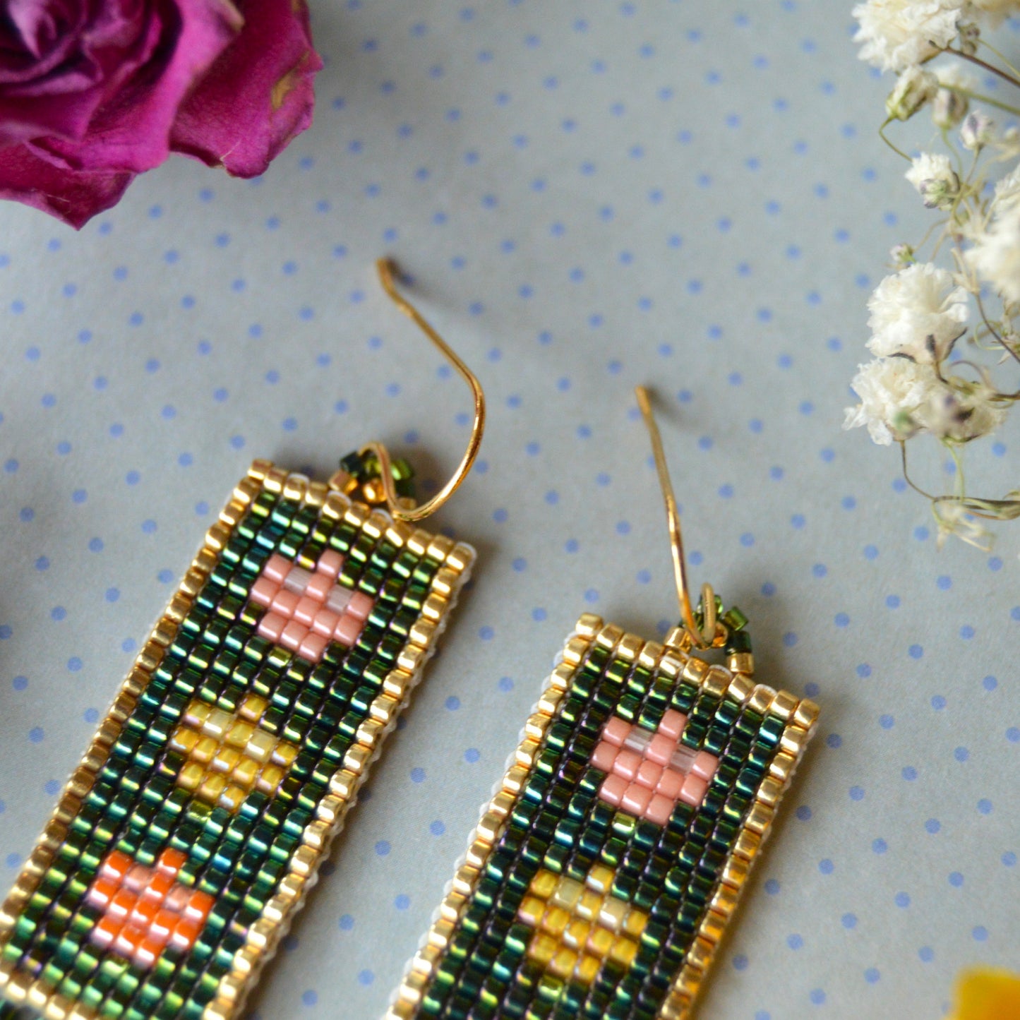 Woven Folklore Flowers earrings beaded with Japanese seed beads and Czech glass faceted beads.