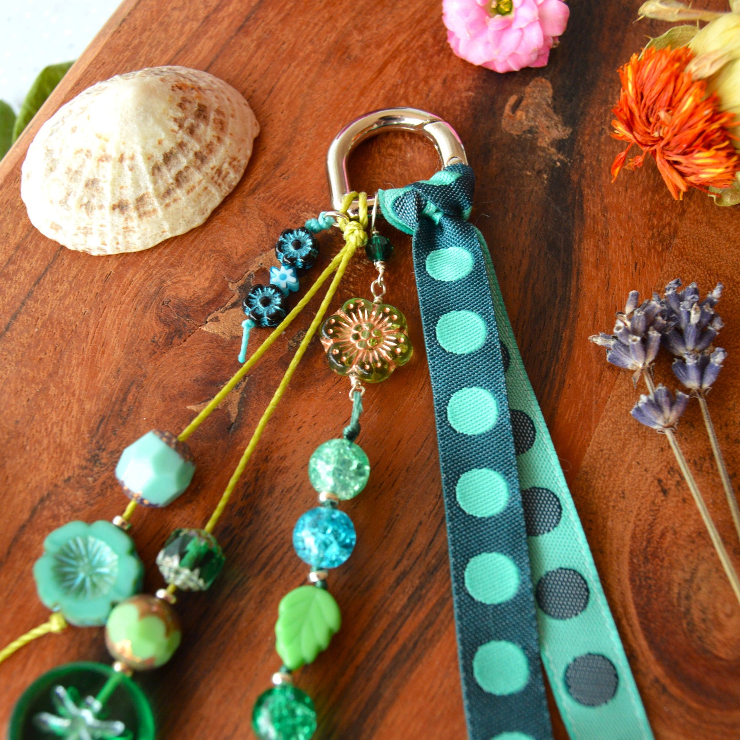 Handbag charm with Czech beads and ribbon in green and blue tones.