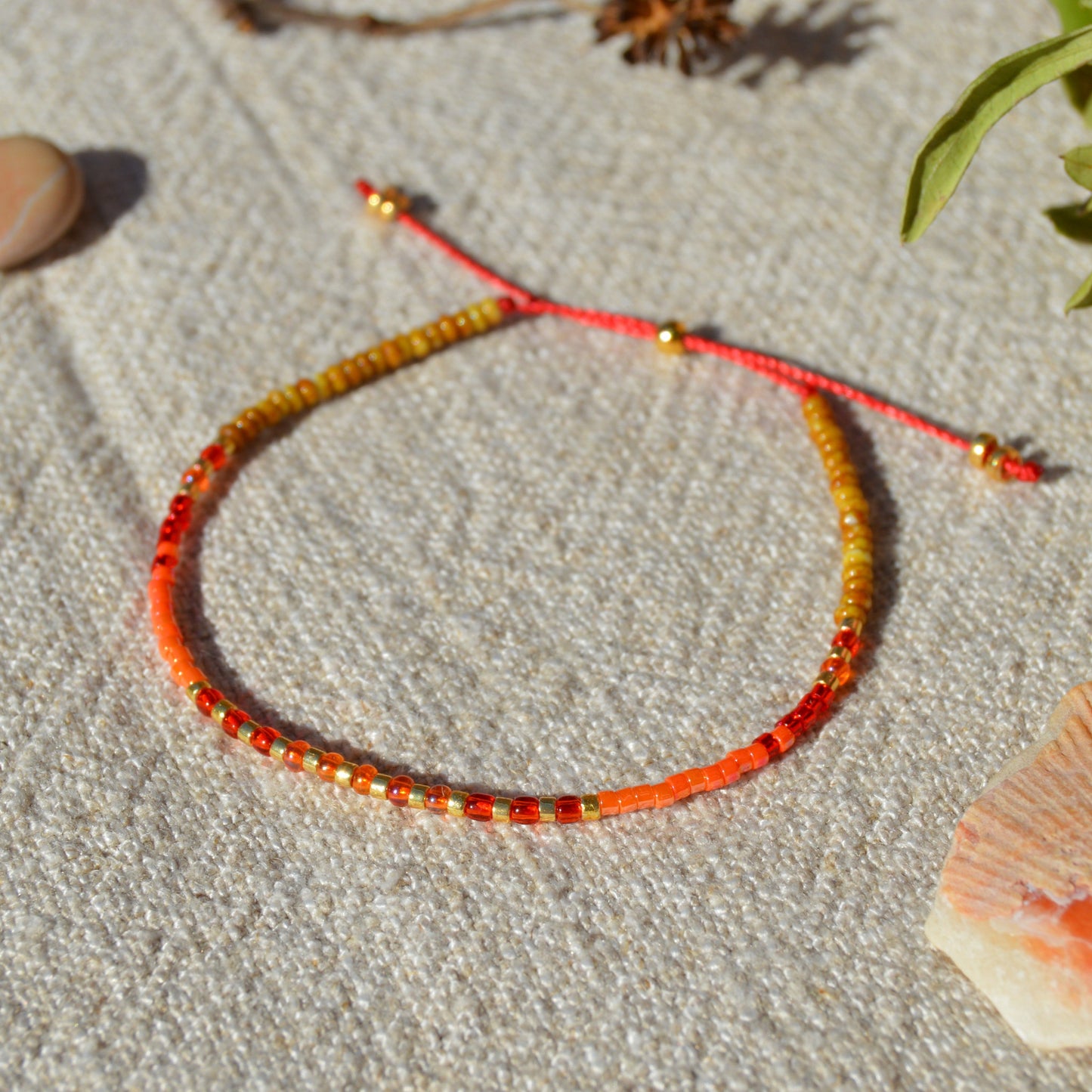 Adjustable seed beads bracelet with silicone stopper bead in gold-plated sterling silver. Nature inspired bracelet Closer to the Sun.