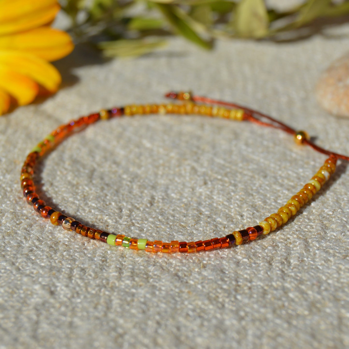 Adjustable seed beads bracelet with silicone stopper bead in gold-plated sterling silver. Nature inspired bracelet Closer to the Earth.