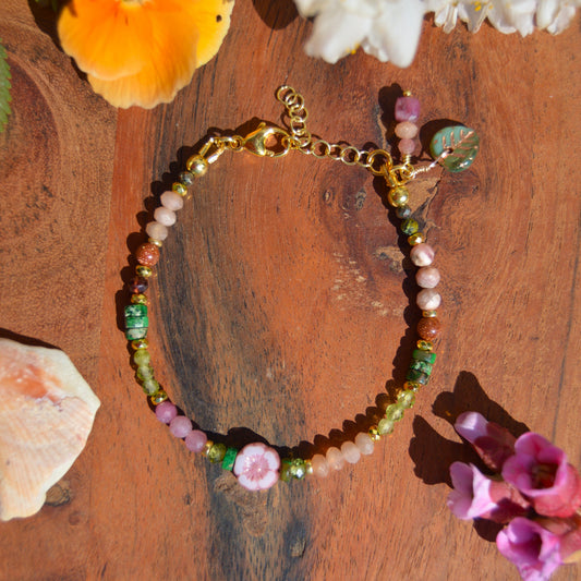 Gold-plated gemstone sterling silver bracelet with Czech glass flower and leaf beads.
