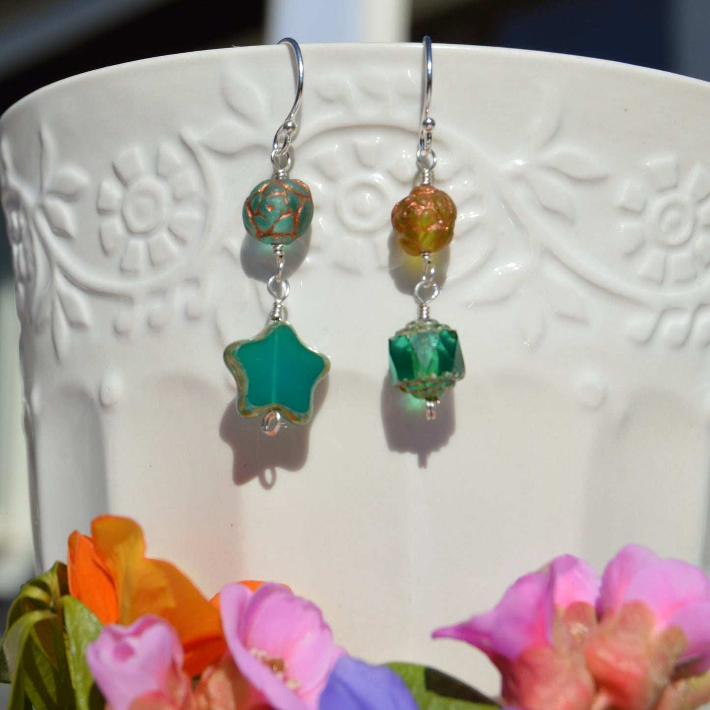 Sterling silver earrings made of Czech glass beads in green and turquoise tones.
