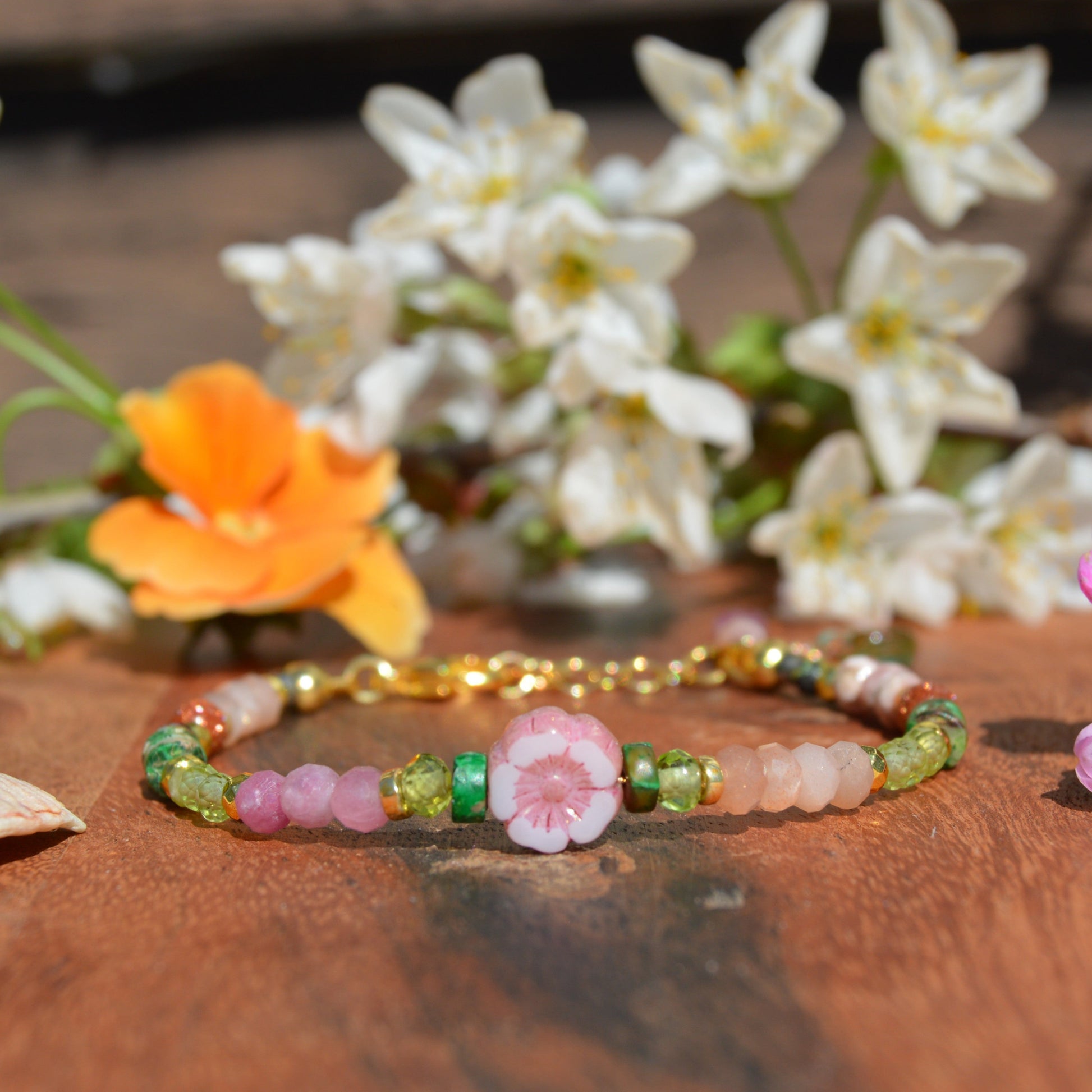 Gold-plated gemstone sterling silver bracelet with Czech glass flower and leaf beads.