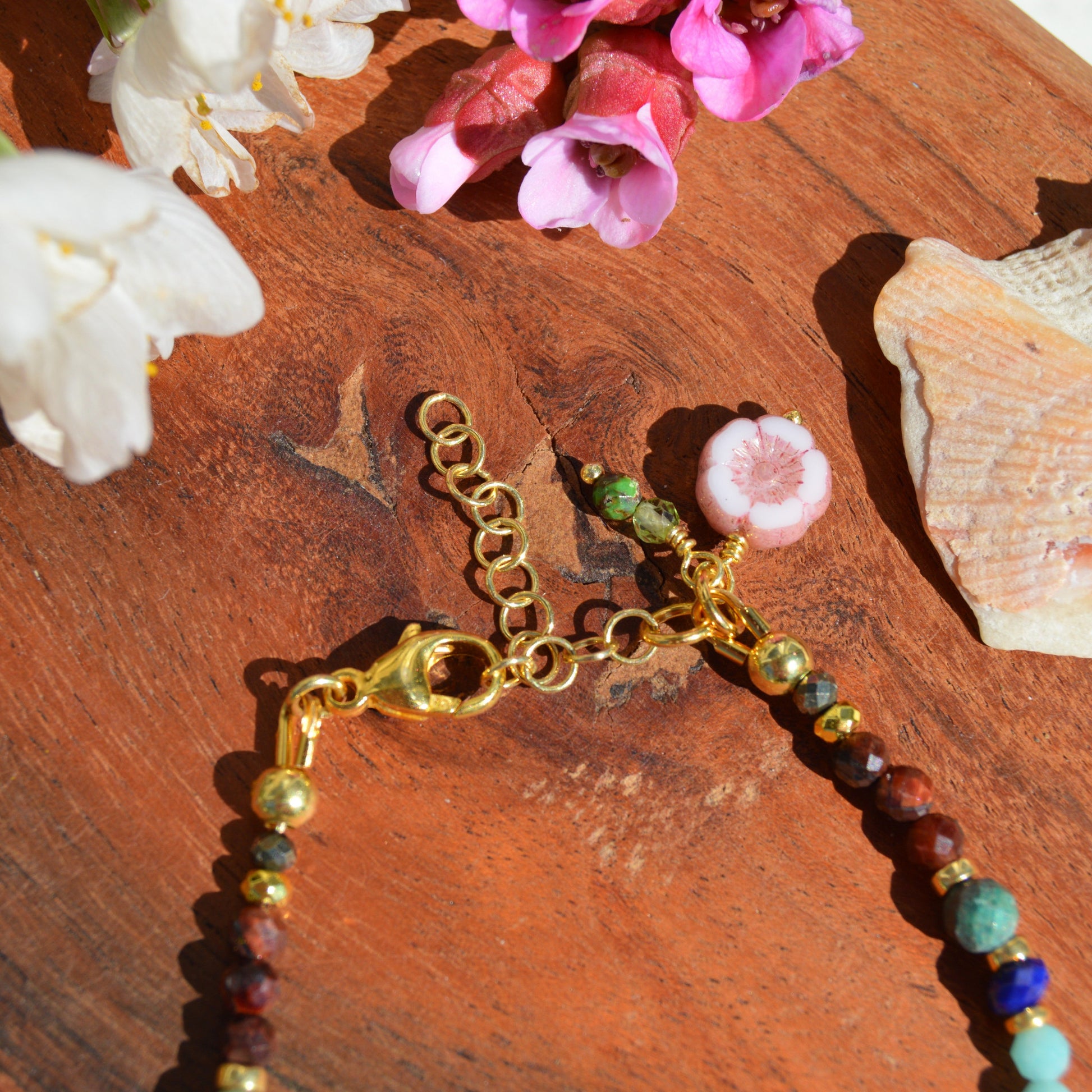Gold-plated sterling silver bracelet made of colourful gemstones with Czech glass flower bead.