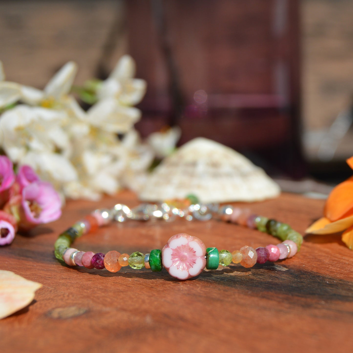 Sterling silver bracelet made of colourful gemstones with Czech glass flower beads.