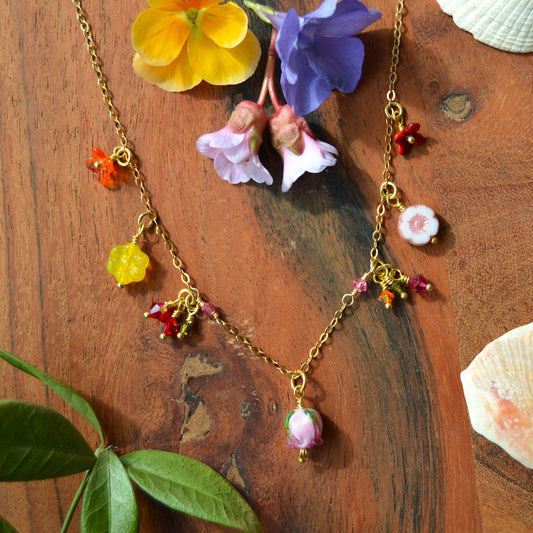 One of a kind gold-plated sterling silver necklace with glass flower & faceted bicones charms. Colourful. 