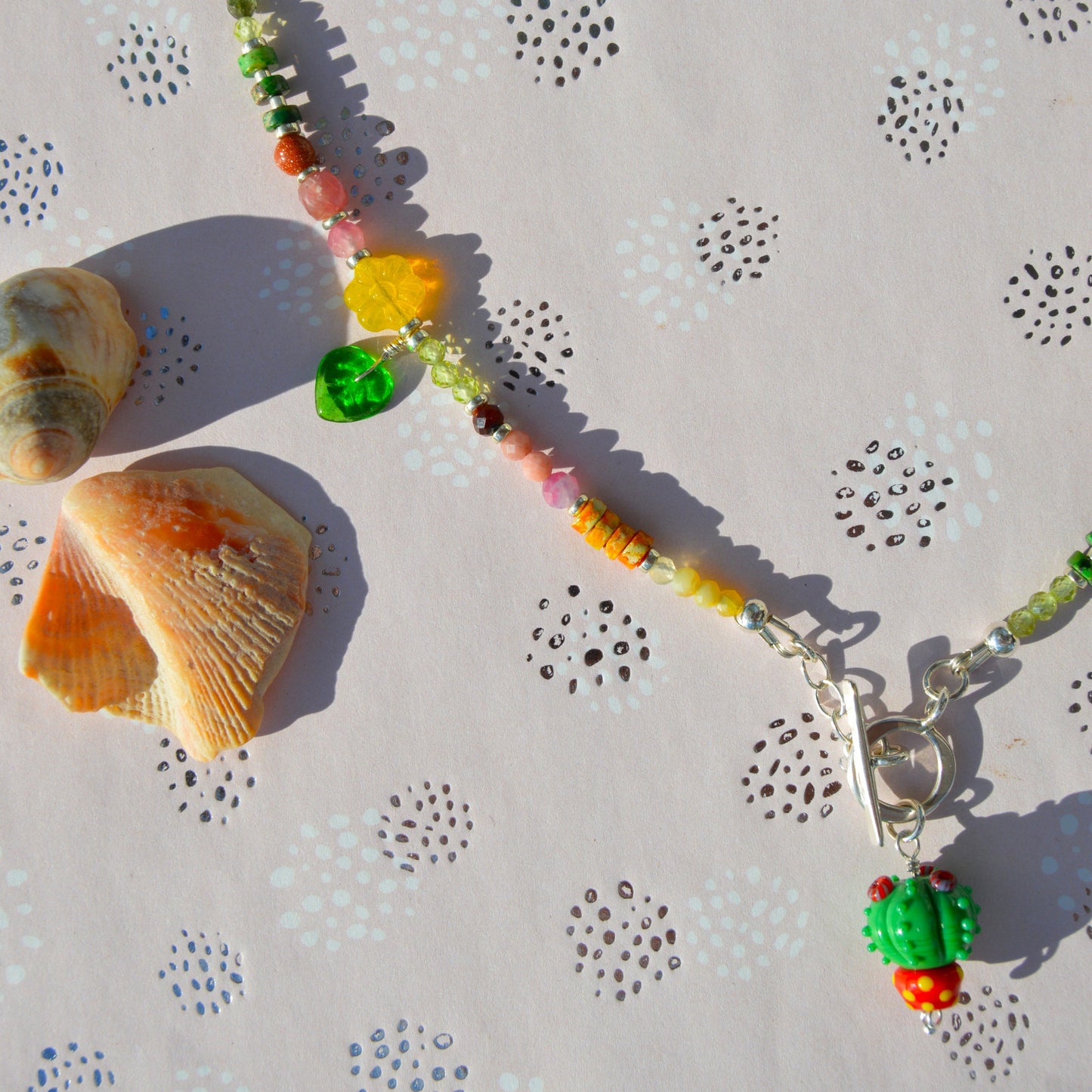 One of a kind sterling silver gemstone necklace with Blooming Cactus lampwork charm and toggle lock.