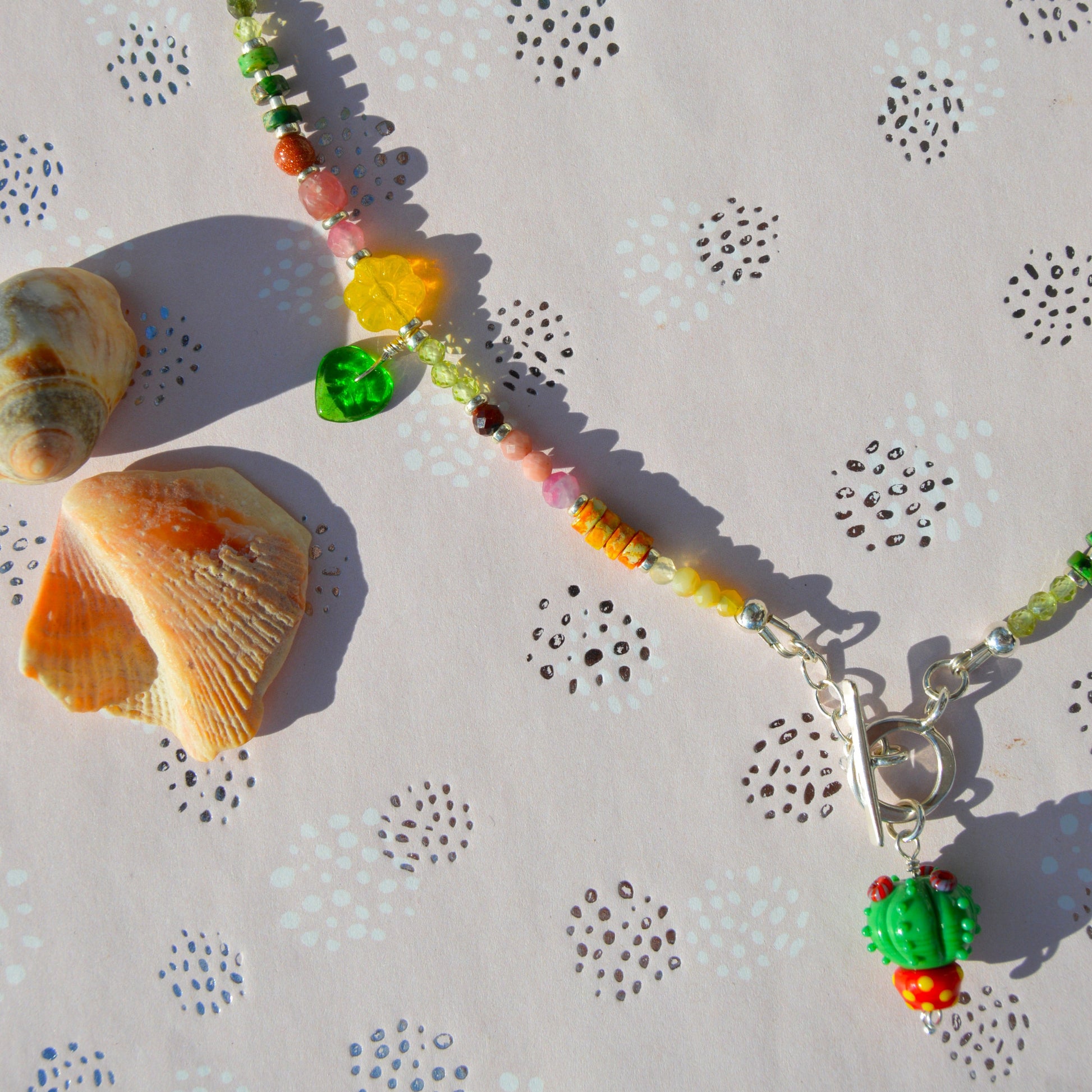 One of a kind sterling silver gemstone necklace with Blooming Cactus lampwork charm and toggle lock.