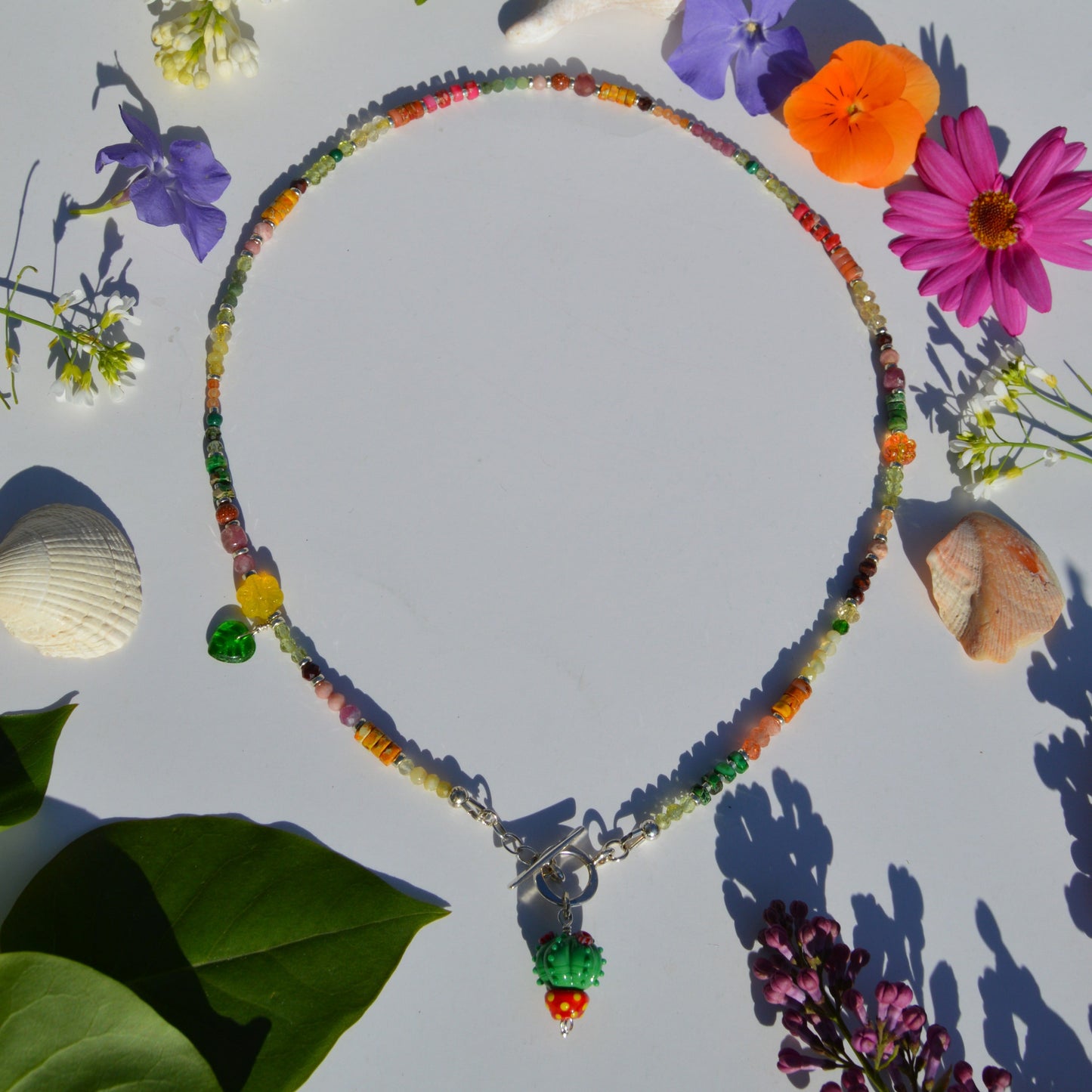 One of a kind sterling silver gemstone necklace with Blooming Cactus lampwork charm and toggle lock.