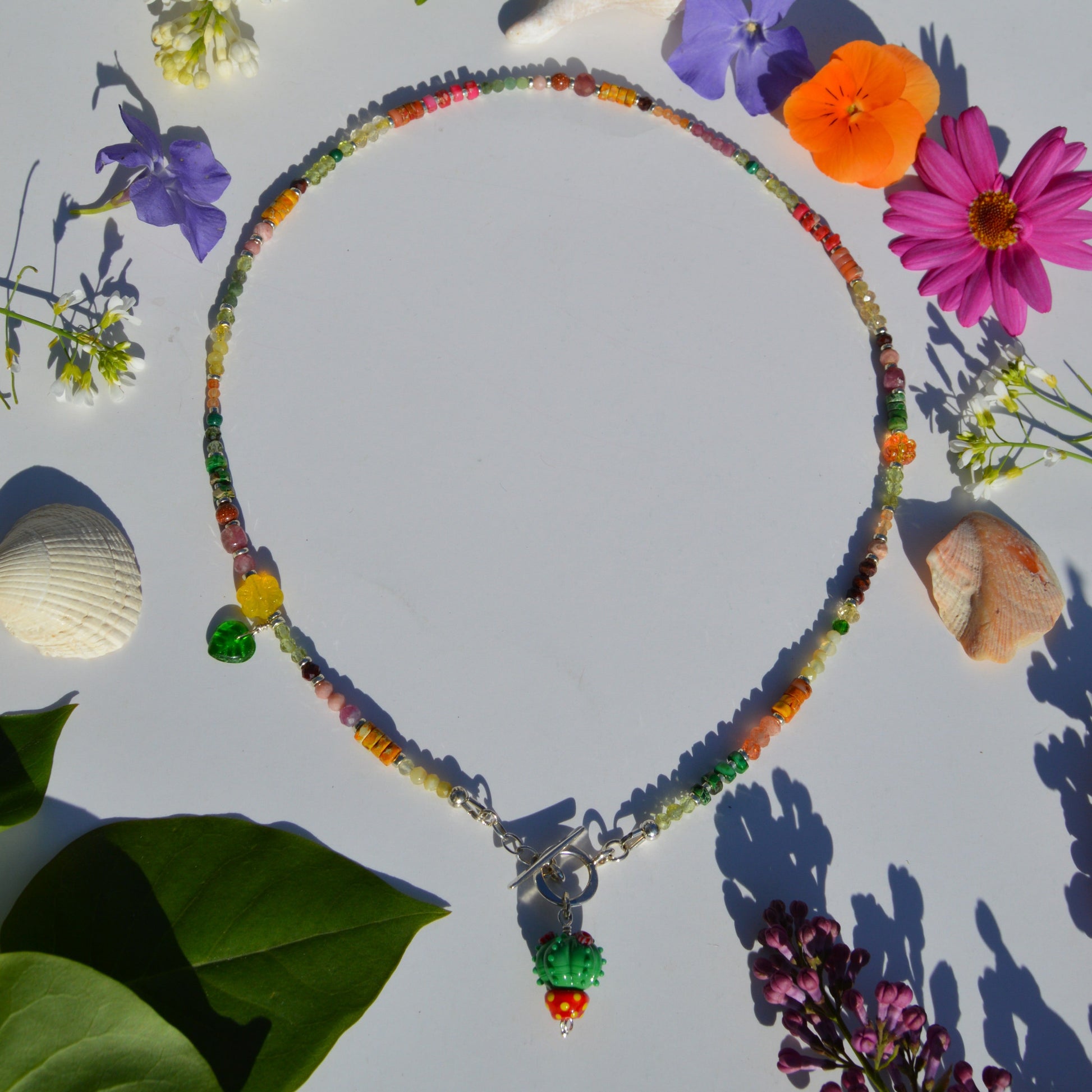 One of a kind sterling silver gemstone necklace with Blooming Cactus lampwork charm and toggle lock.