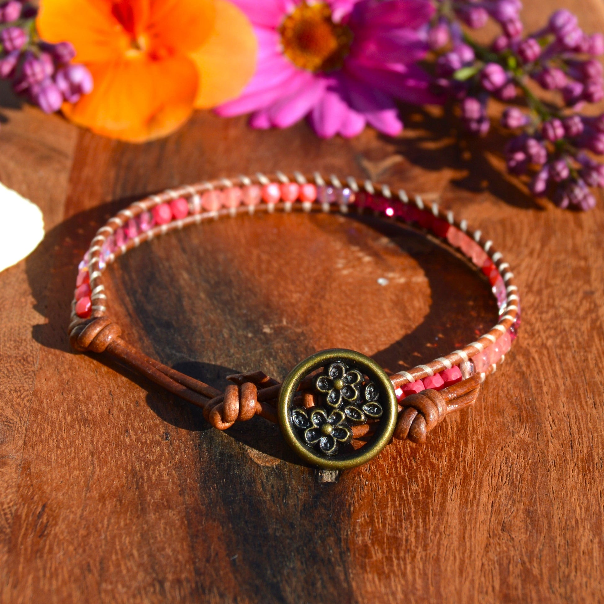 Leather wrap bracelet with Czech glass beads and a button as a lock.