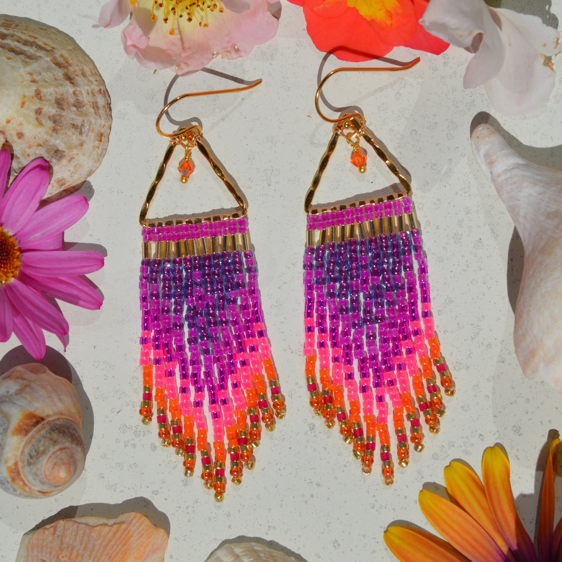 Small fringe earrings made of high-quality Japanese seed beads woven on gold-plated 925 sterling silver hammered triangles, decorated with Czech faceted glass bicones.