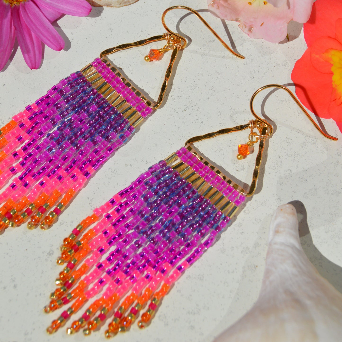 Small fringe earrings made of high-quality Japanese seed beads woven on gold-plated 925 sterling silver hammered triangles, decorated with Czech faceted glass bicones.