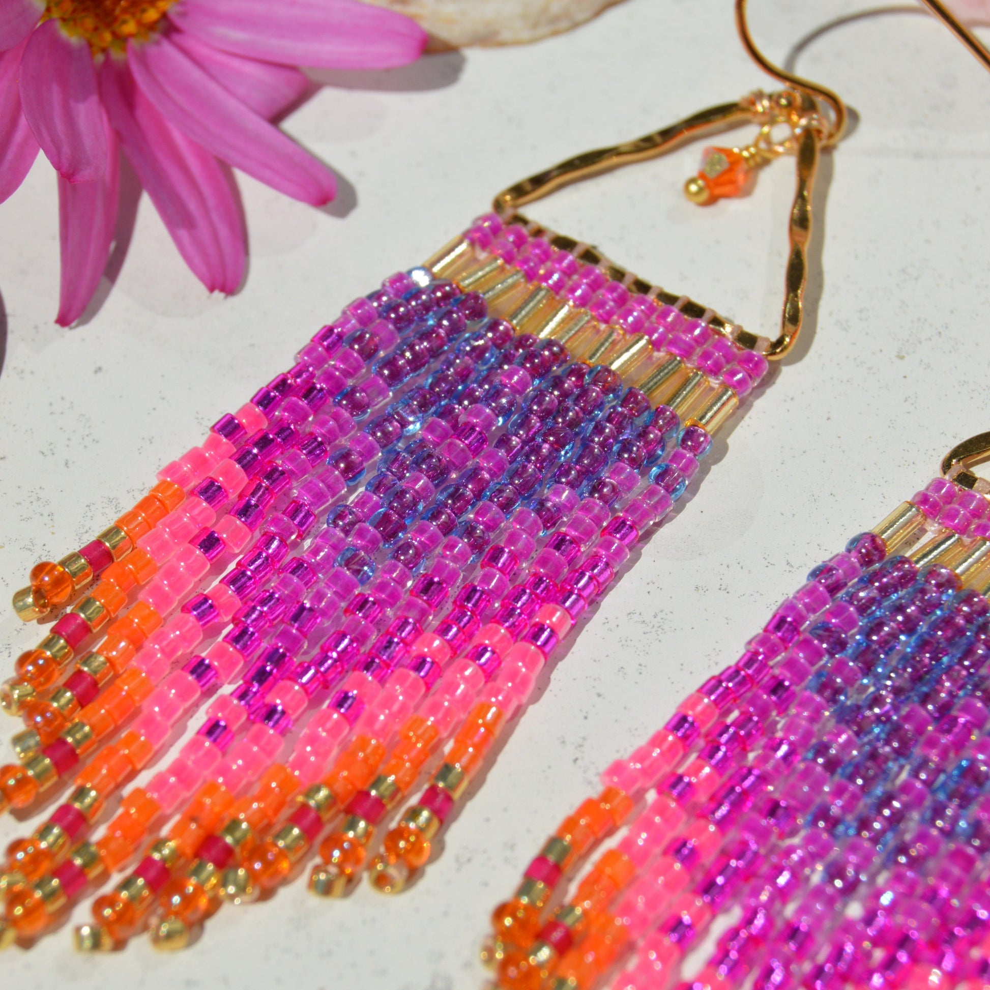 Small fringe earrings made of high-quality Japanese seed beads woven on gold-plated 925 sterling silver hammered triangles, decorated with Czech faceted glass bicones.