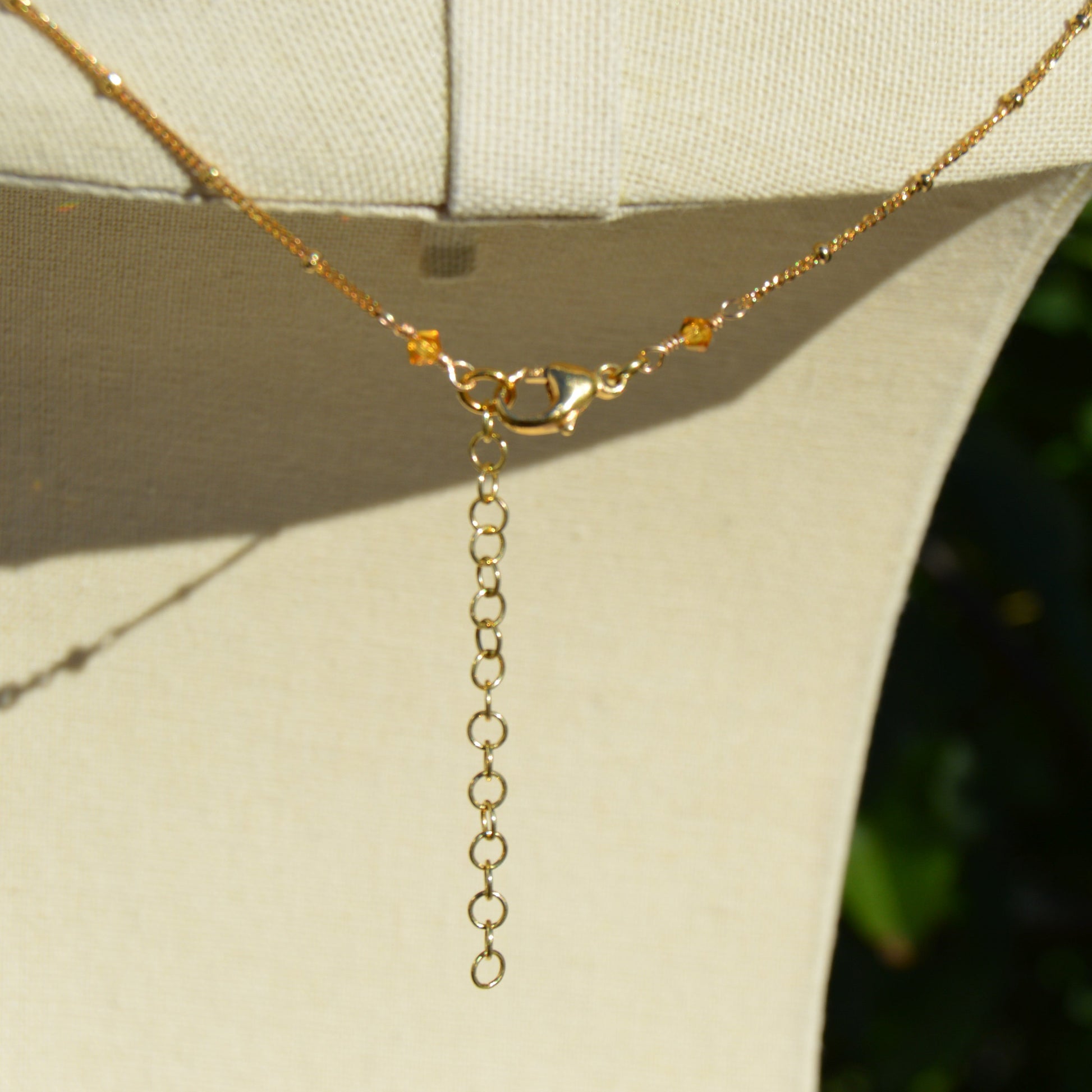 Necklace Closer to the Earth made of Japanese and Czech seed beads and Czech faceted glass crystals. Woven on a nylon thread attached to gold-plated sterling silver chain. Delicate and bohemian.