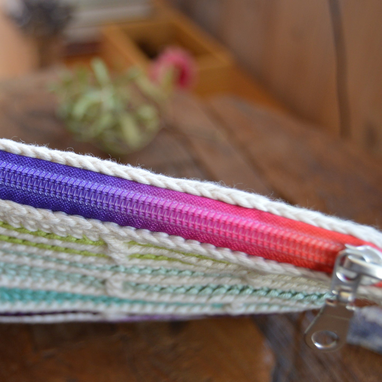 Mosaic crochet clutch handbag Falling Into Bricks with colorful zipper.