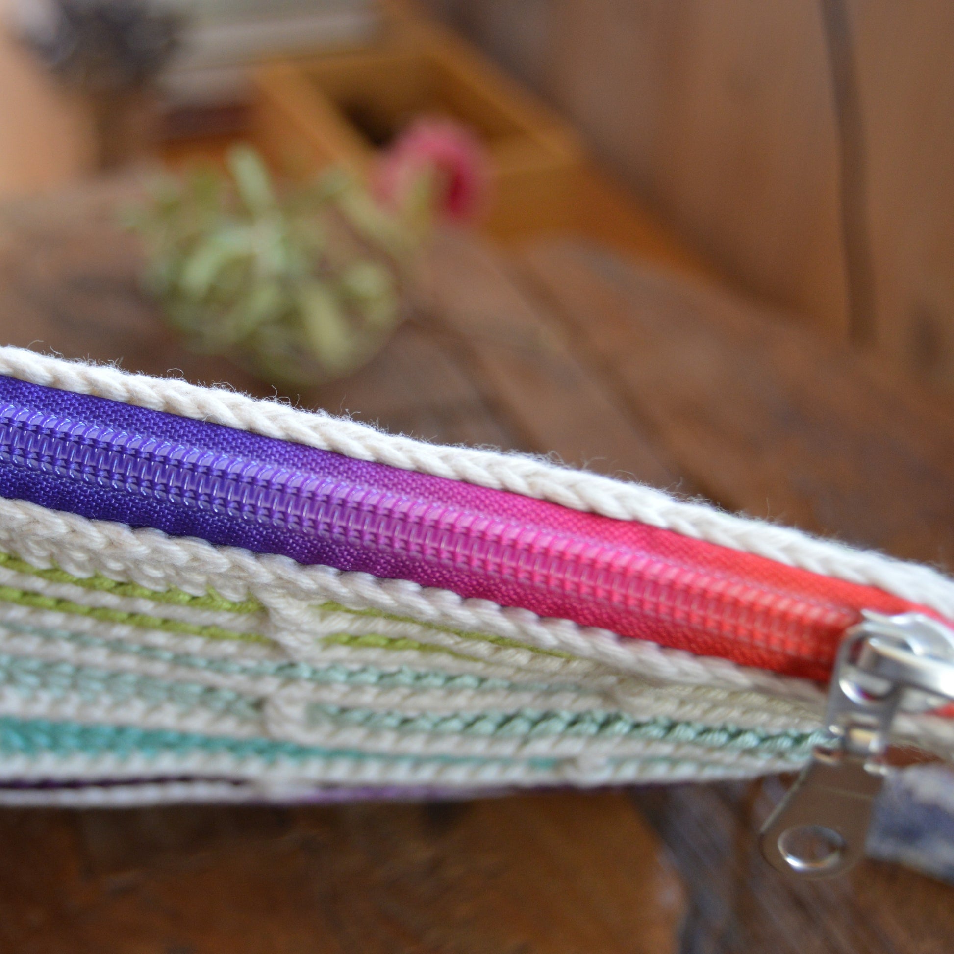 Mosaic crochet clutch handbag Falling Into Bricks with colorful zipper.