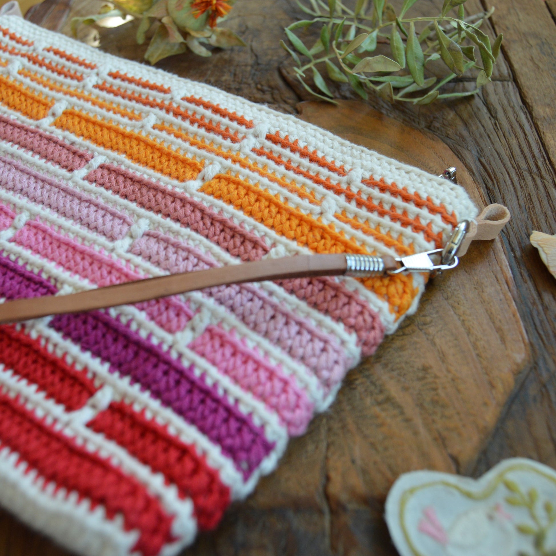 Crochet cotton Clutch Handbag Falling into Bricks. Leather hang.