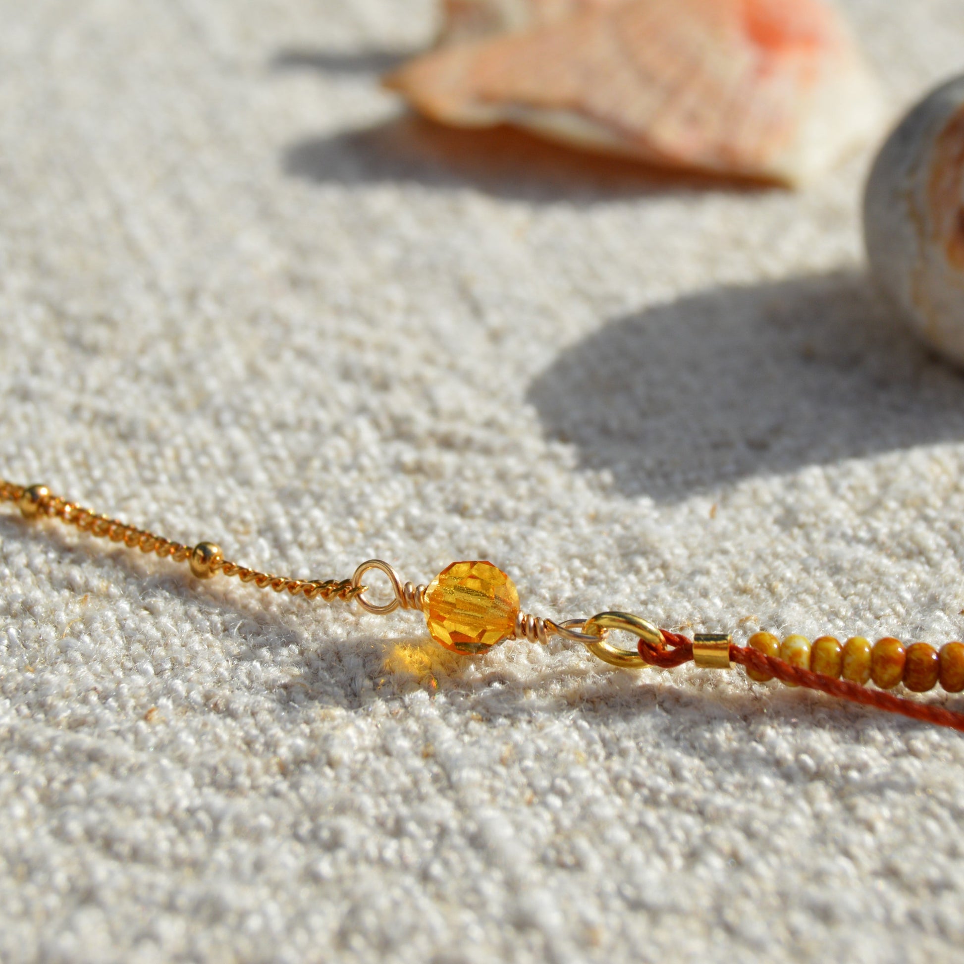 Necklace Closer to the Earth made of Japanese and Czech seed beads and Czech faceted glass crystals. Woven on a nylon thread attached to gold-plated sterling silver chain. Delicate and bohemian.