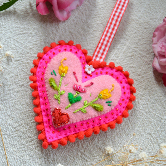 Embroidered Wool Folklore Heart with flower motif, decorated with glass seed beads.