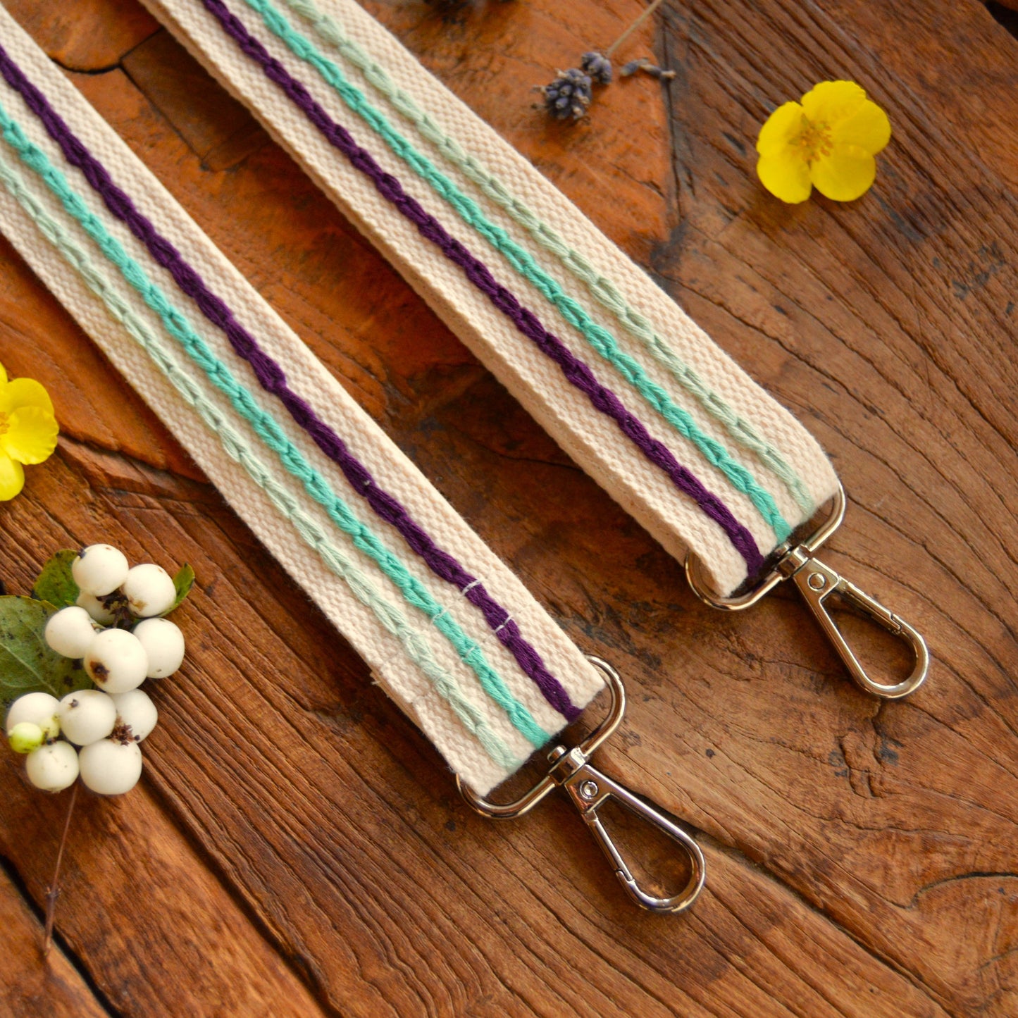 Colourful adjustable embroidered strap.