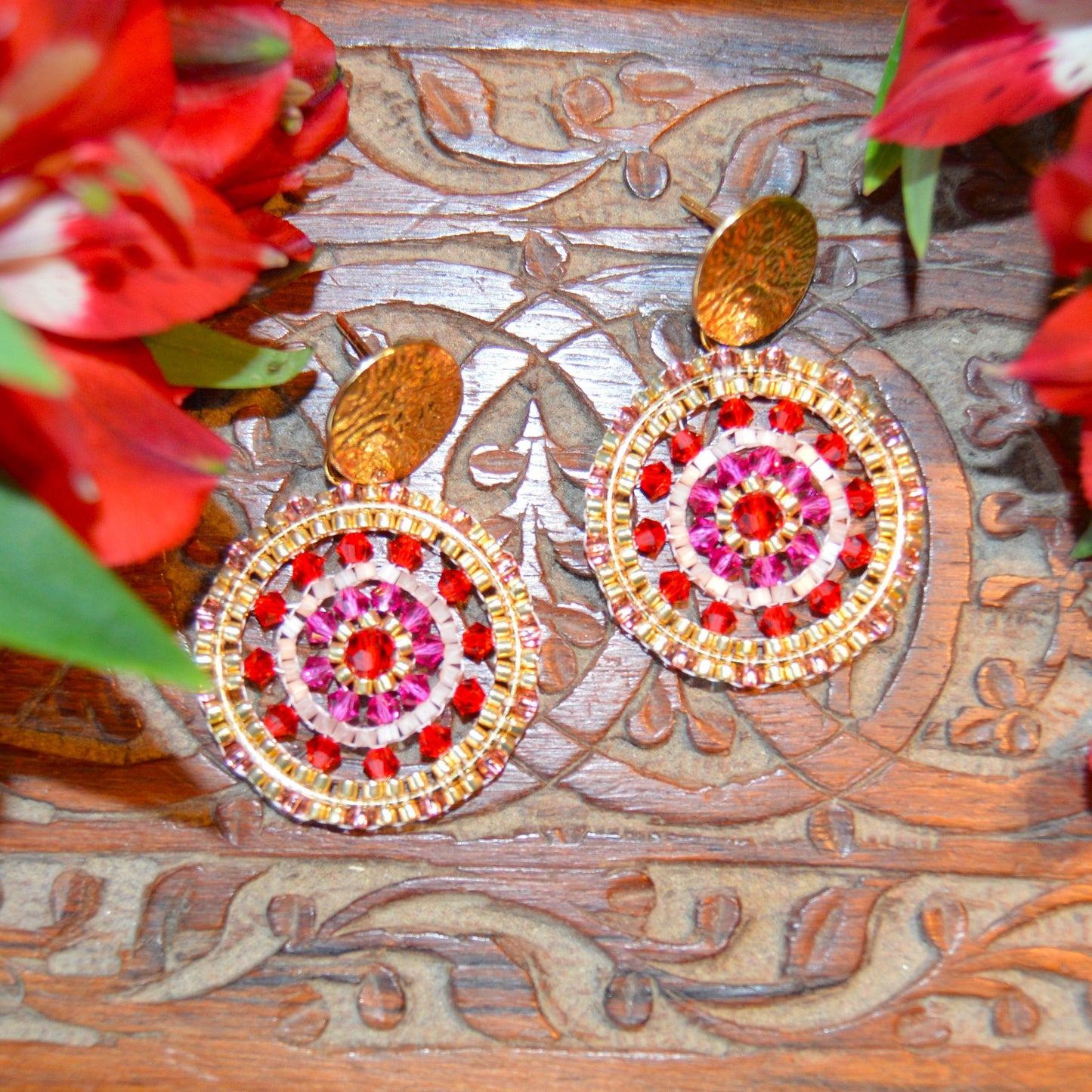 Woven statement earrings Decadence.