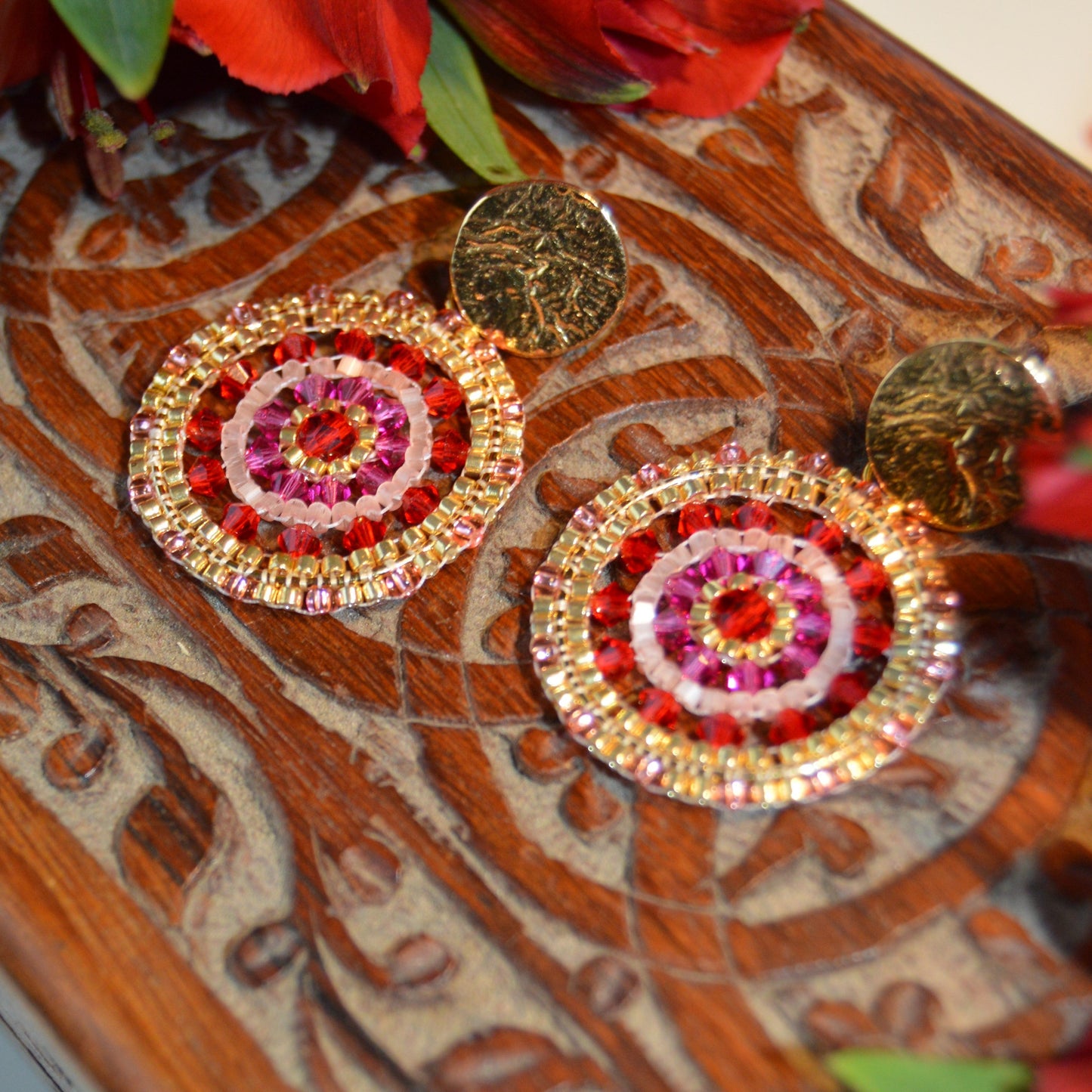 Woven statement earrings Decadence.