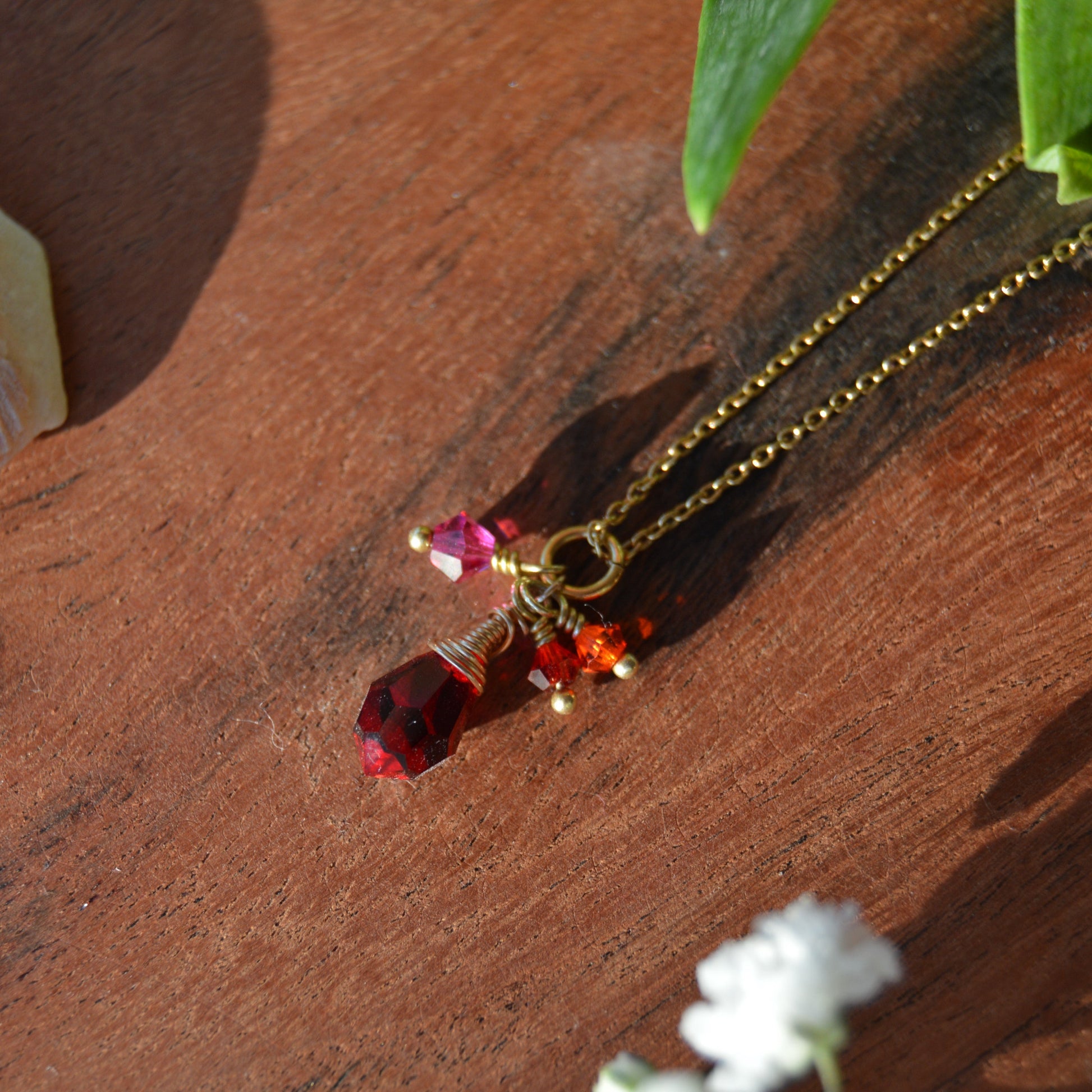 Gold-plated sterling silver necklace with small cluster of Premium Czech glass bicones and wire-wrapped drop.