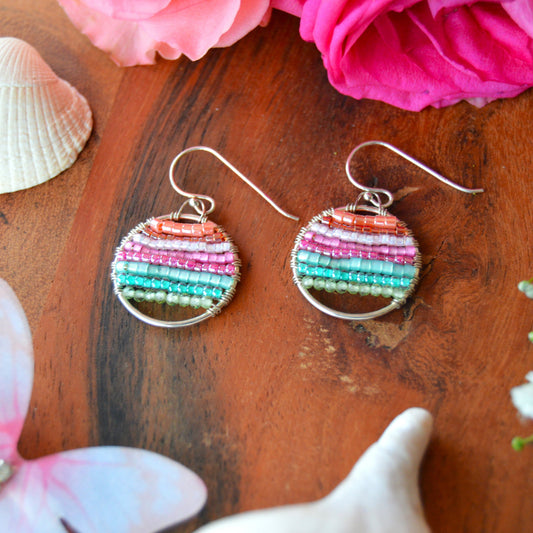 Sterling silver hoops in light, pastel colours wire-wrapped with gemstones and Japanese glass seed beads.