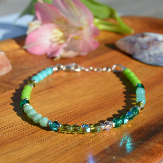 Sterling silver bracelet made of Czech faceted beads, bicones and crystals.