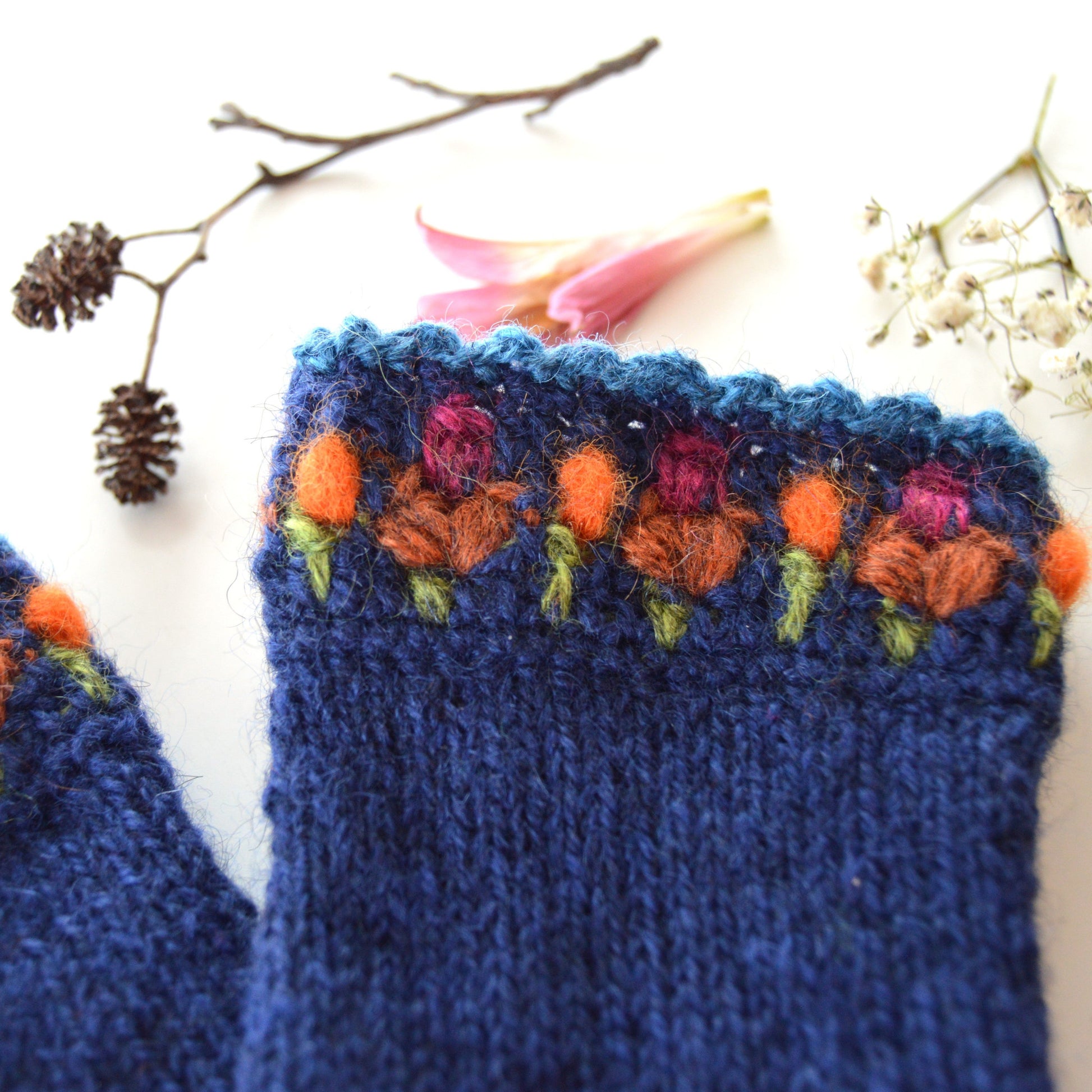 Blue Crochet Flowers pulse warmers in 100% Norwegian Wool with crochet details.
