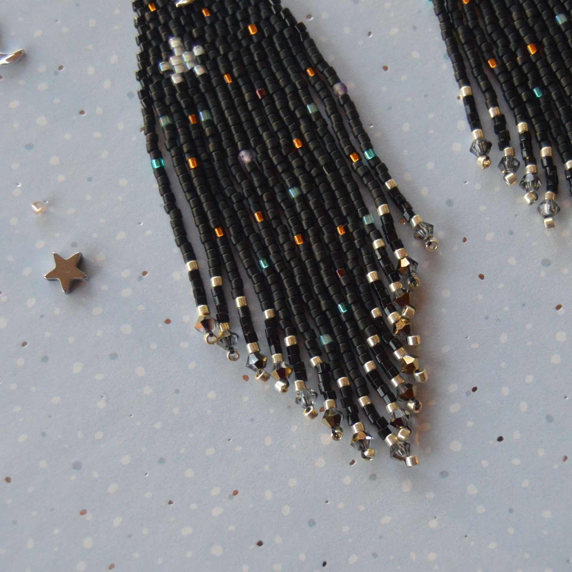Fringe earrings.