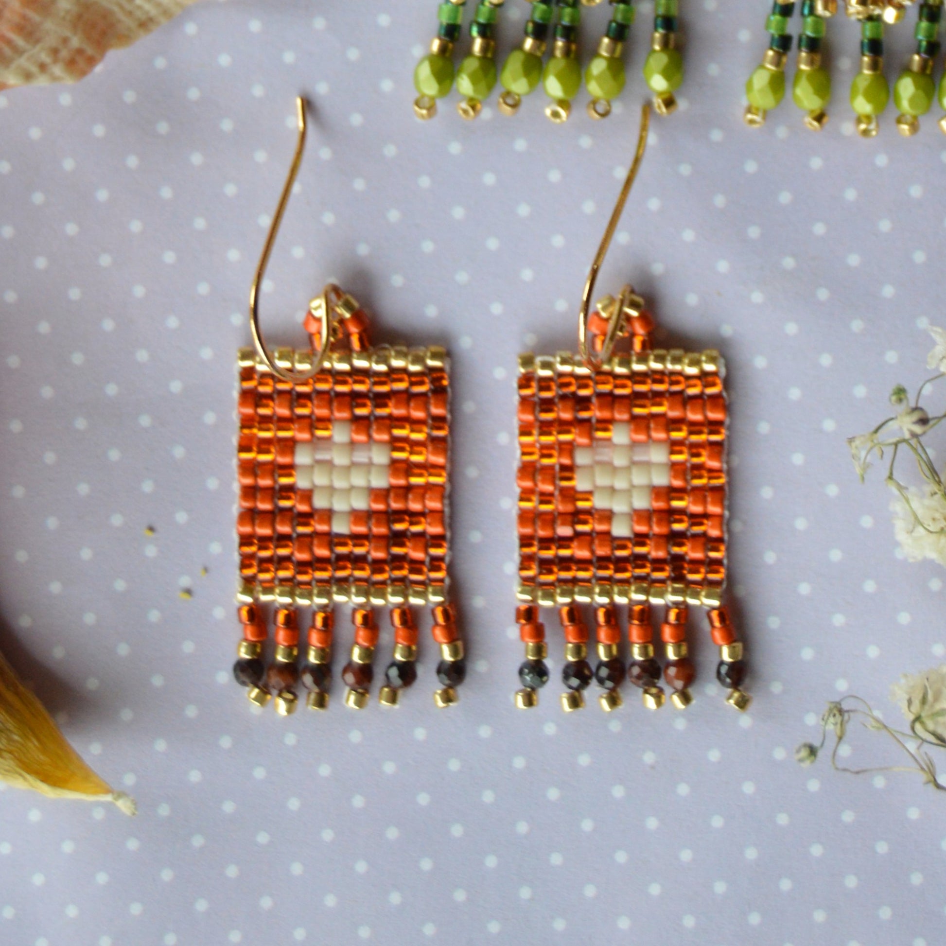 Small woven earrings Folklore Flowers beaded with Japanese seed beads and Red Tiger Eye gemstones.