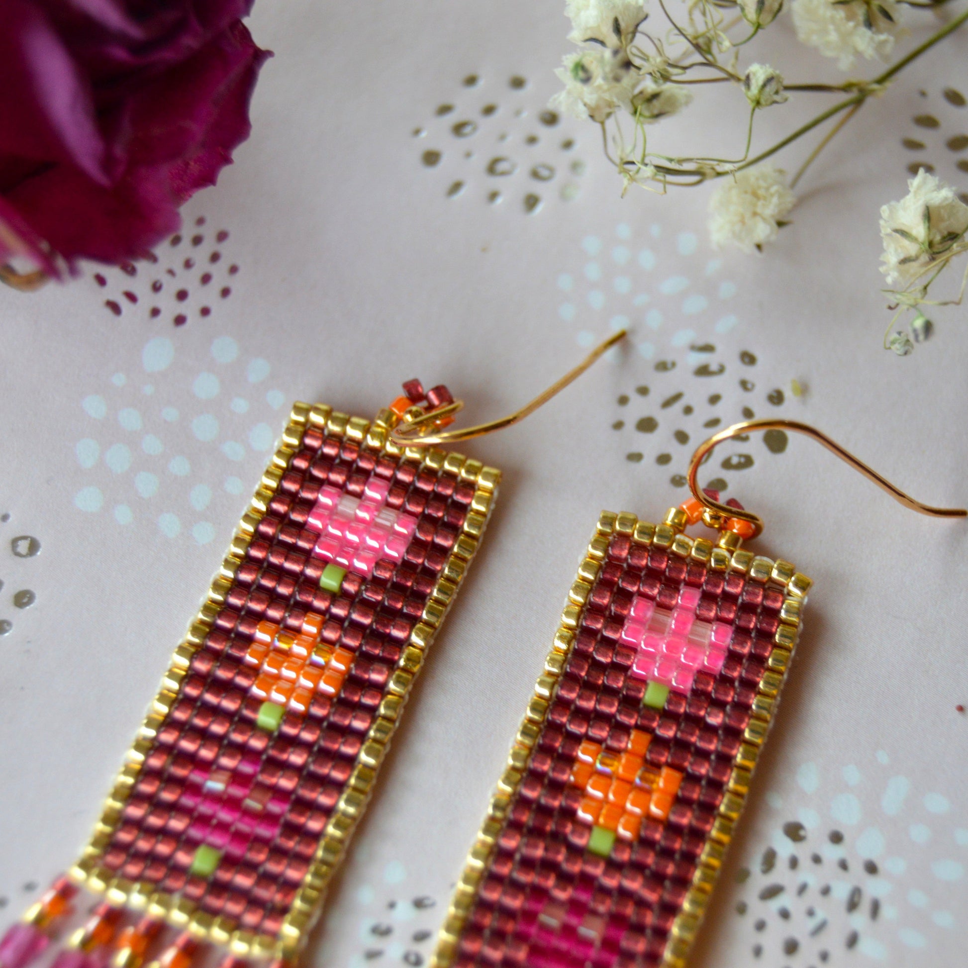 Woven Folklore Flowers earrings beaded with Japanese seed beads and Czech glass faceted beads.