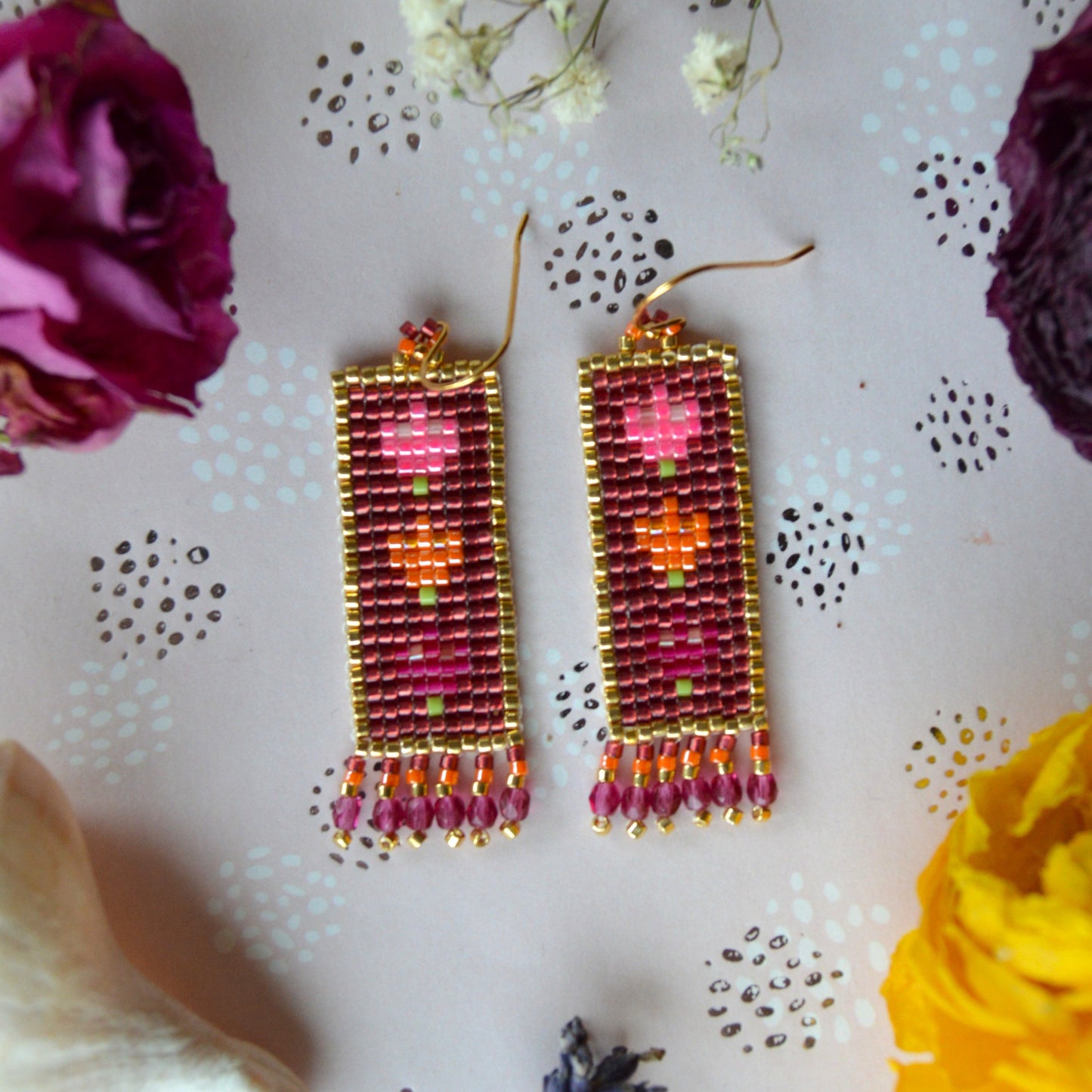 Woven Folklore Flowers earrings beaded with Japanese seed beads and Czech glass faceted beads.