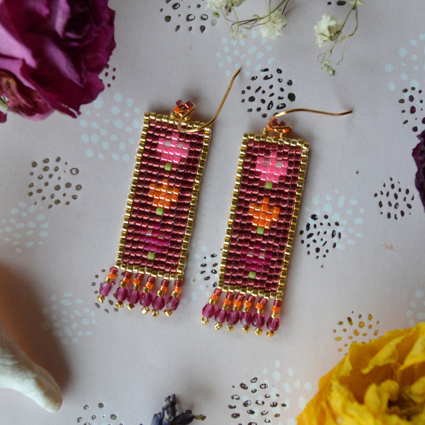 Woven Folklore Flowers earrings beaded with Japanese seed beads and Czech glass faceted beads.