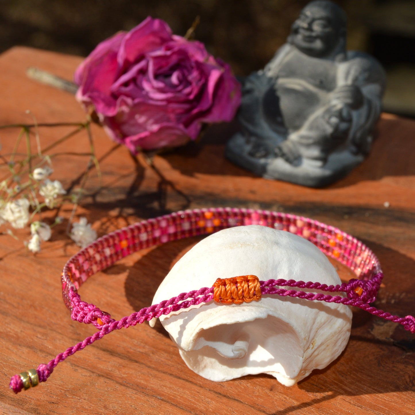 Woven beaded bracelet made of Japanese seed beads with macrame details.