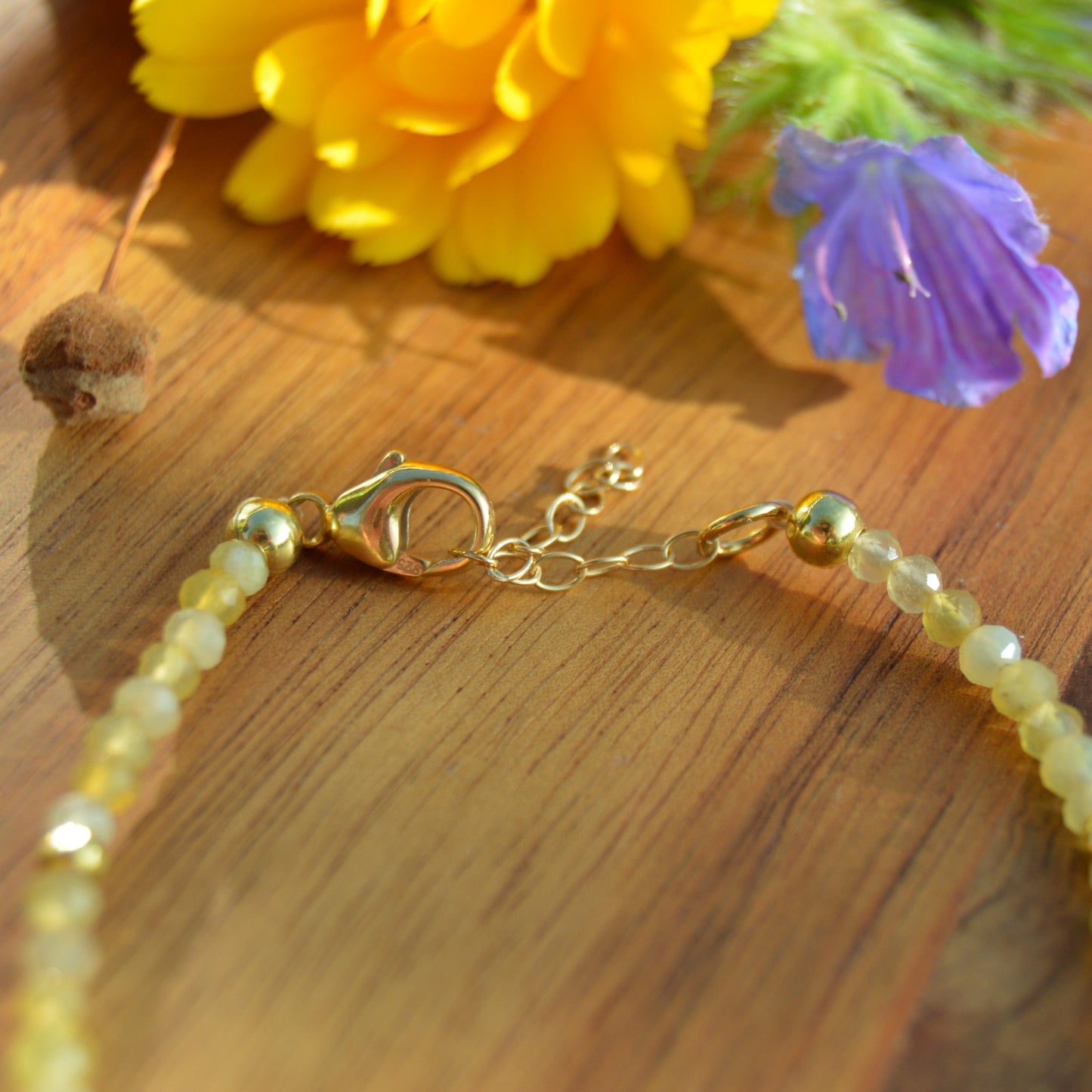 Yellow Opal & Gold Hematite gemstone bracelet in gold-plated sterling silver with extension chain.