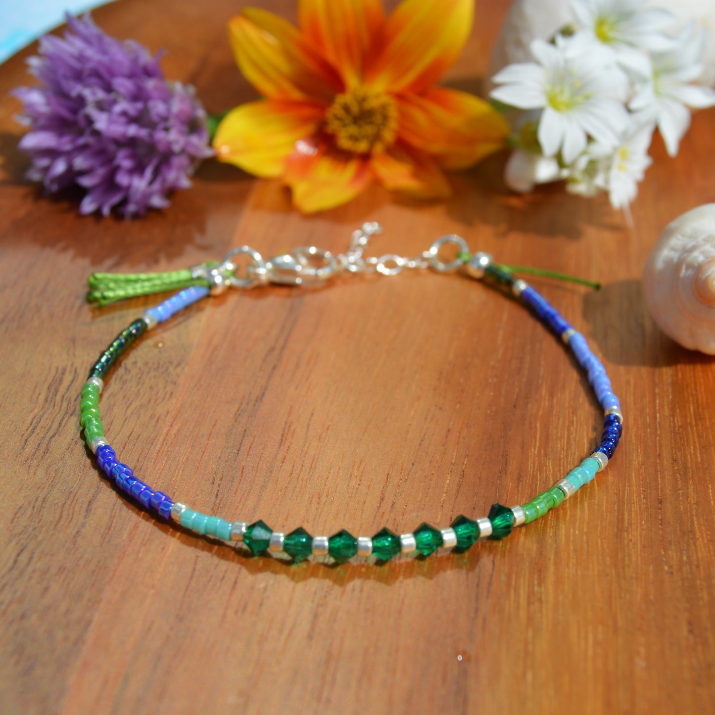 Sterling Silver Bracelet with Czech faceted bicones & a tassel - emerald