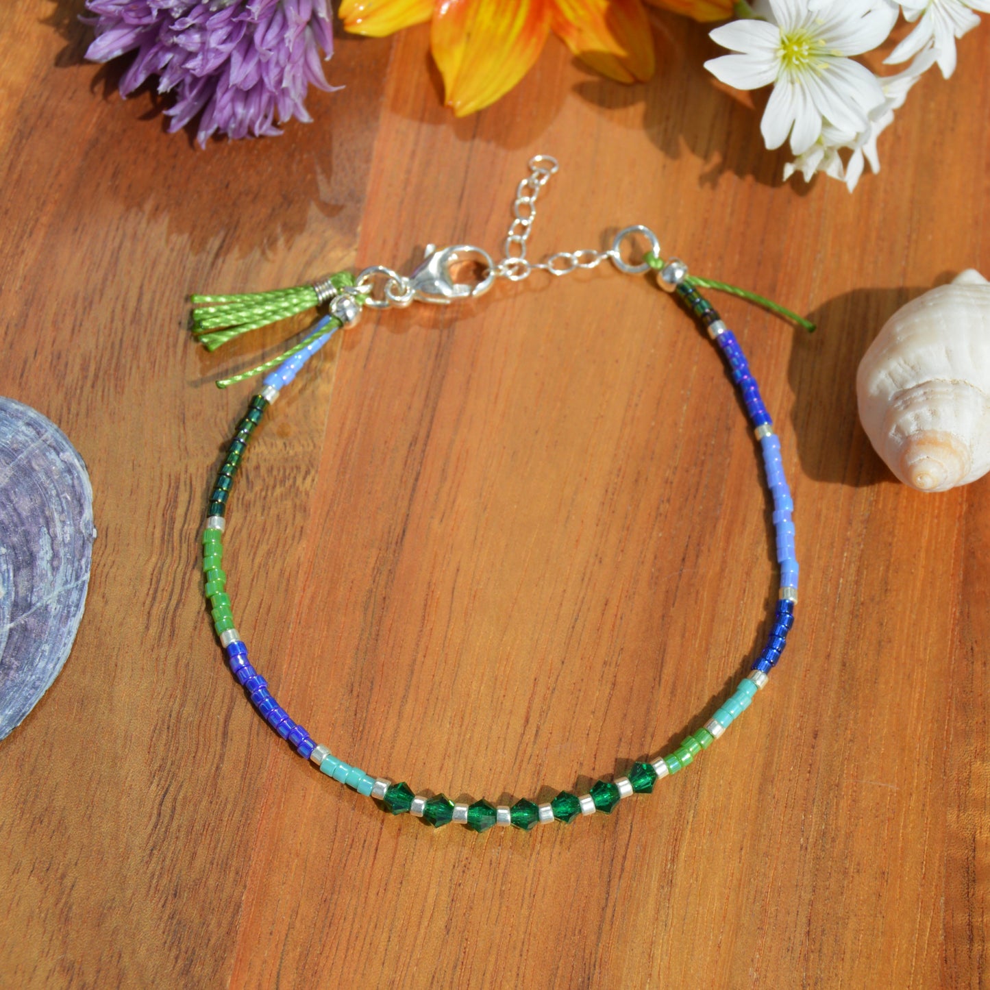 Sterling Silver Bracelet with Czech faceted bicones & a tassel - emerald