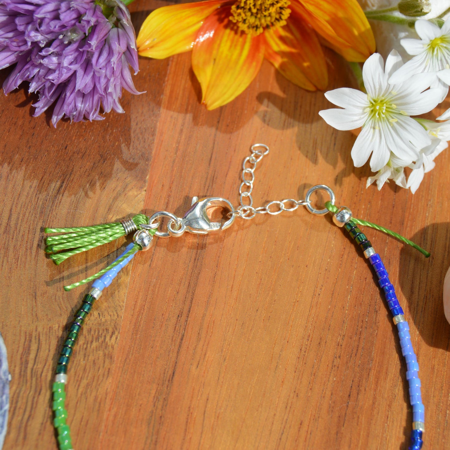 Sterling Silver Bracelet with Czech faceted bicones & a tassel - emerald