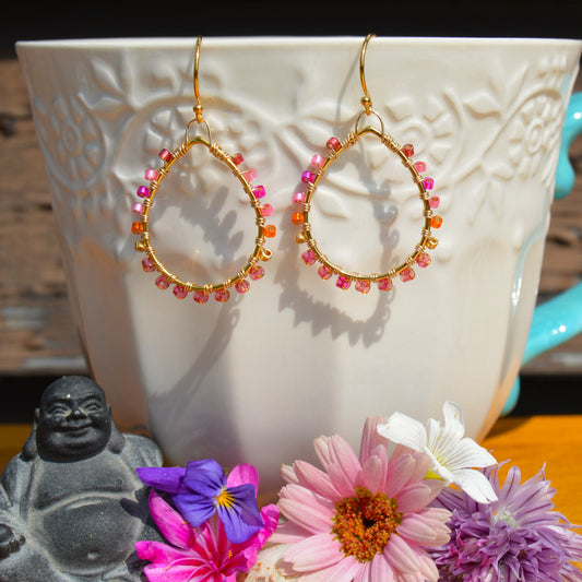 Gold-plated sterling silver drop wire-wrapped earrings.