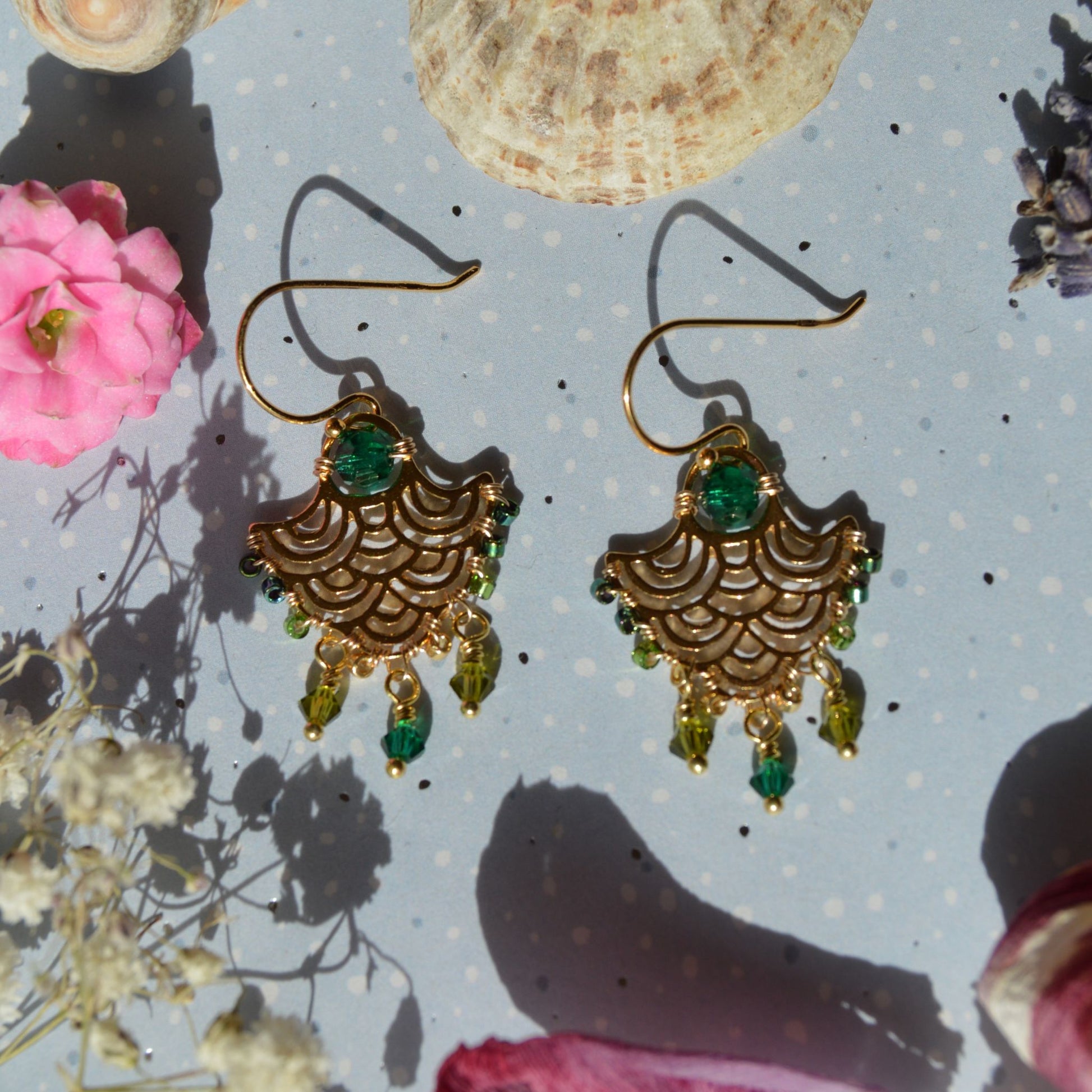 Gold-plated sterling silver earrings with bohemian look and Czech crystals in green tones.