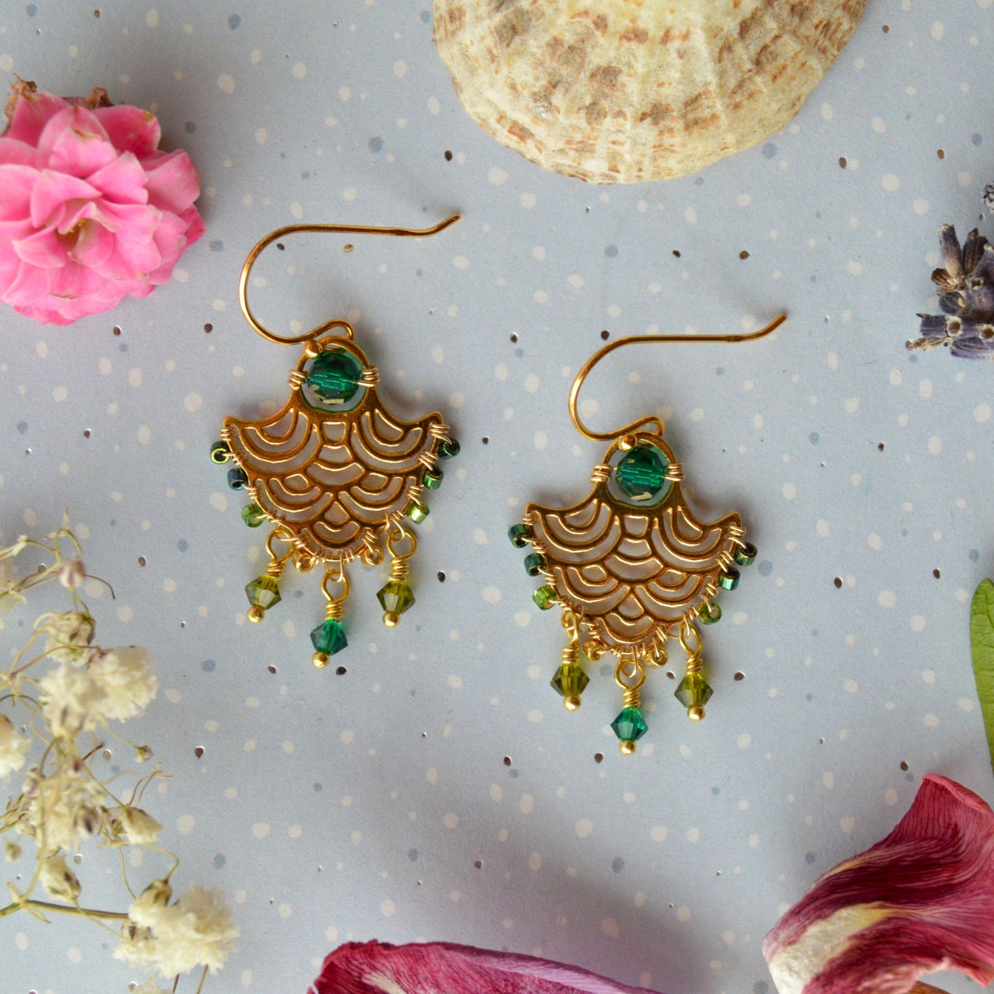 Gold-plated sterling silver earrings with bohemian look and Czech crystals in green tones.