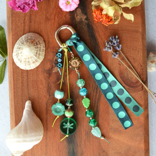 Handbag charm with Czech beads and ribbon in green and blue tones.